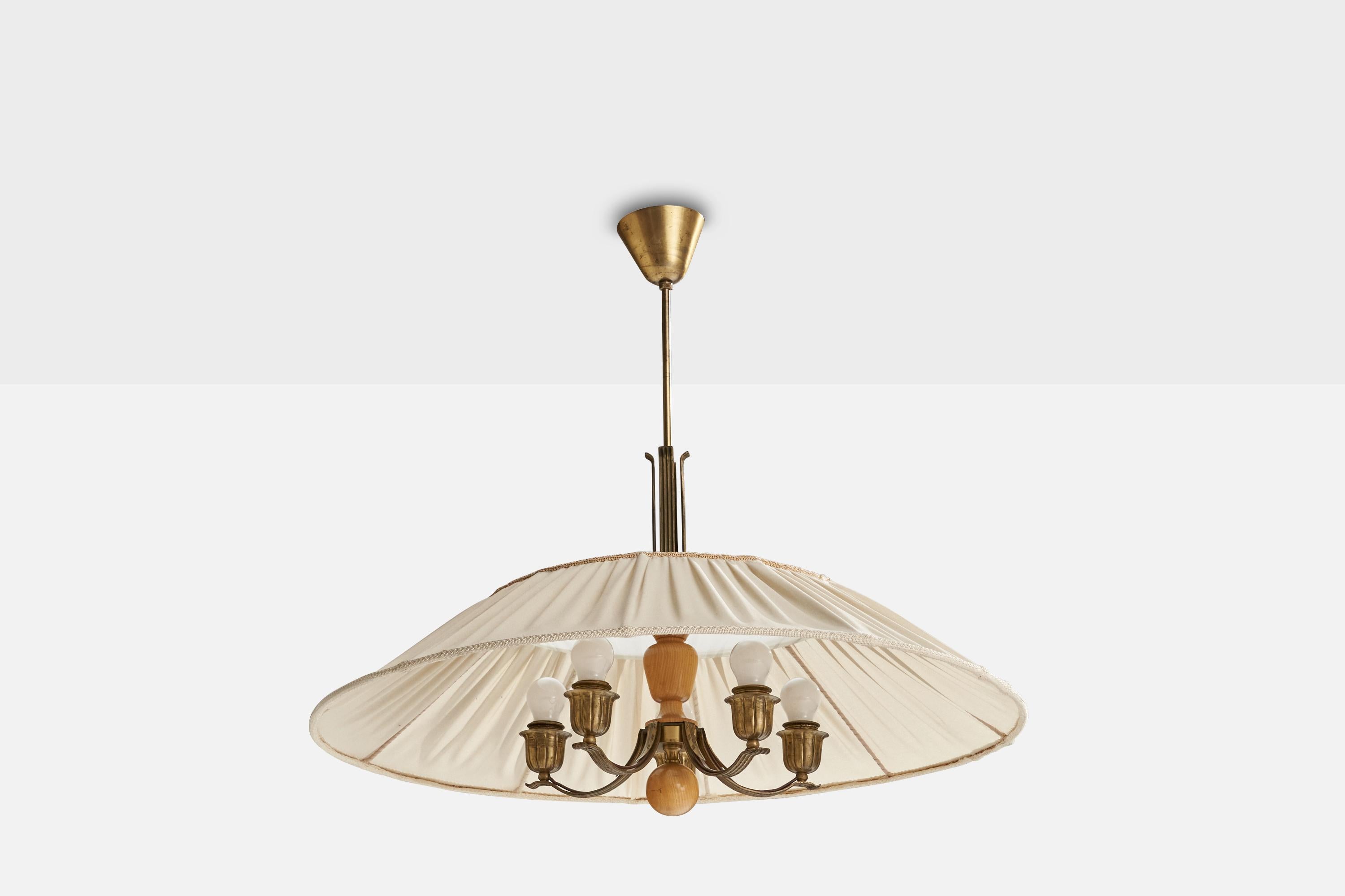 A brass, oak and white fabric chandelier or pendant designed by Harald Notini and produced by Böhlmarks, Sweden, 1940s.

Dimensions of canopy (inches): 4.10” H x 3.50” Diameter
Socket takes standard E-26 bulbs. 5 socket.There is no maximum wattage