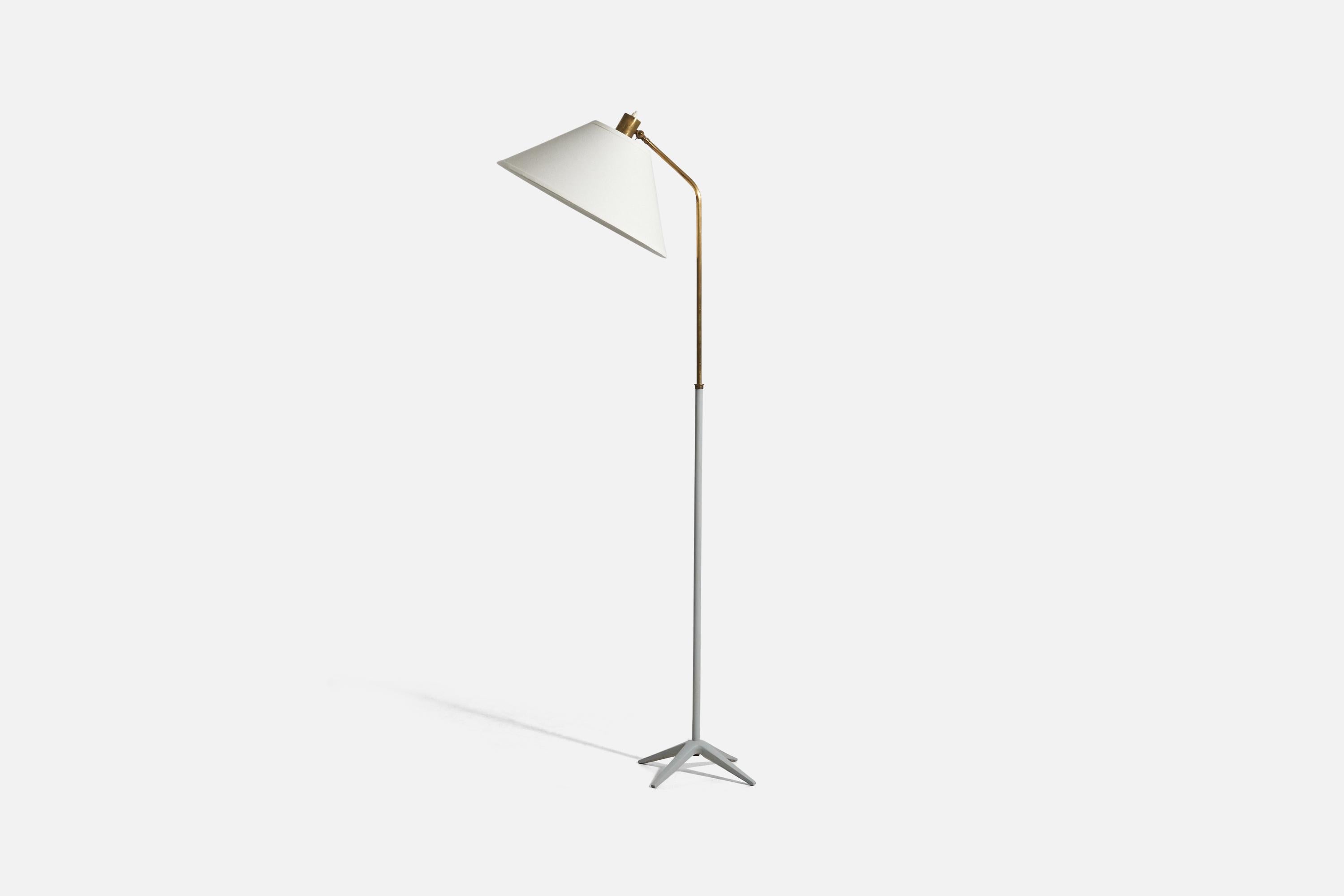 A brass, metal and fabric floor lamp designed by Harald Notini and produced by Böhlmarks, Sweden, 1940s. Stamped with maker's logo.

Dimensions variable, measured as illustrated in first image.

Sold with Lampshade(s). Dimensions stated are of Floor