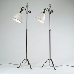 Harald Notini, pair of floor lamps, patinated wrought iron, 1930s