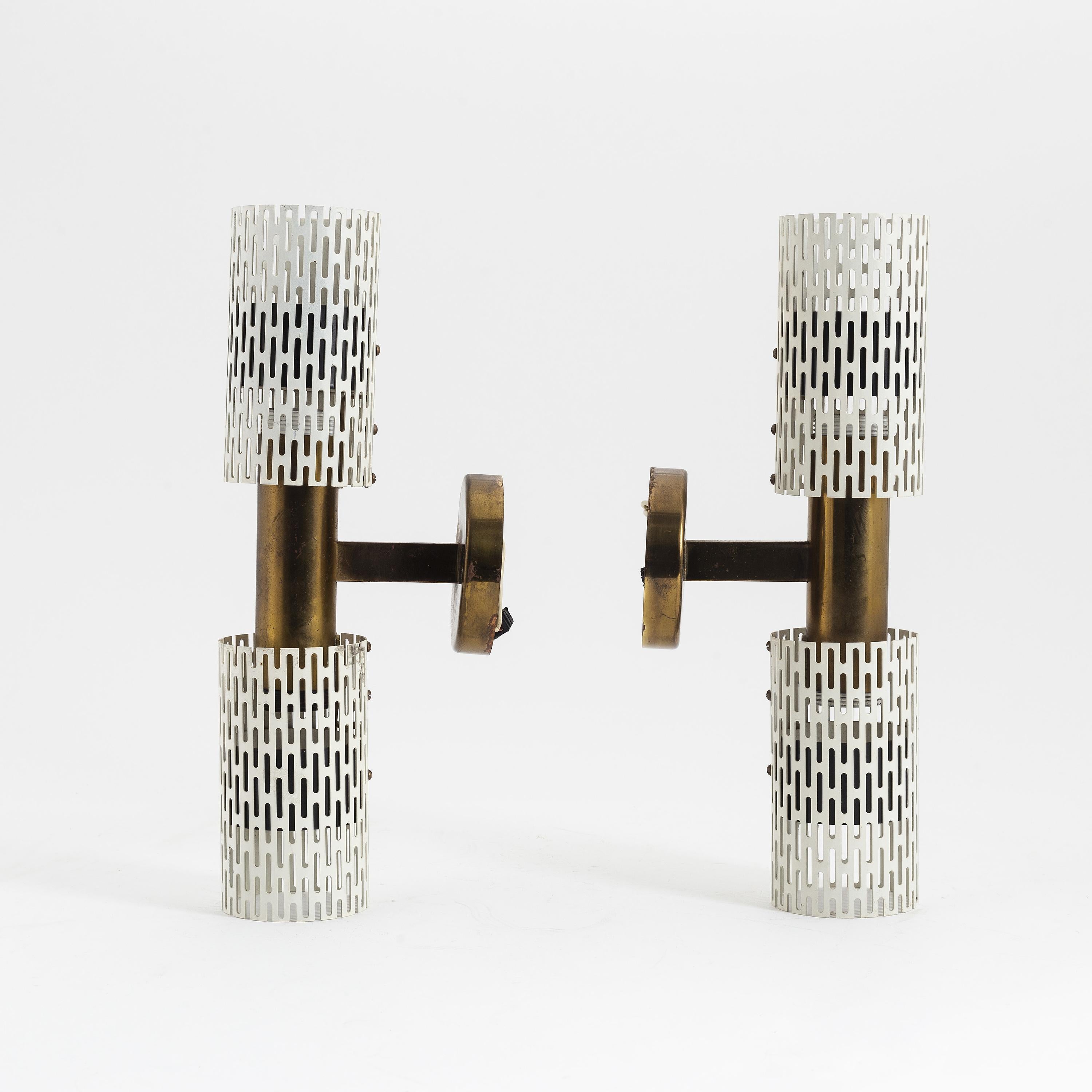 Harald Notini rare pair of sconces Model 11262 for Bohlmarks 1950.
This rare model by Swedish designer and sculptor, Harald Notini. He was the artistic leader at Böhlmarks and is represented at the ‘Nationalmuseum’ in Stockholm.

Between the