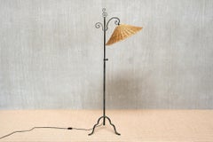 Harald Notini Wrought Iron Floor Lamp, Rattan Shade, Böhlmarks, Sweden, 1930s
