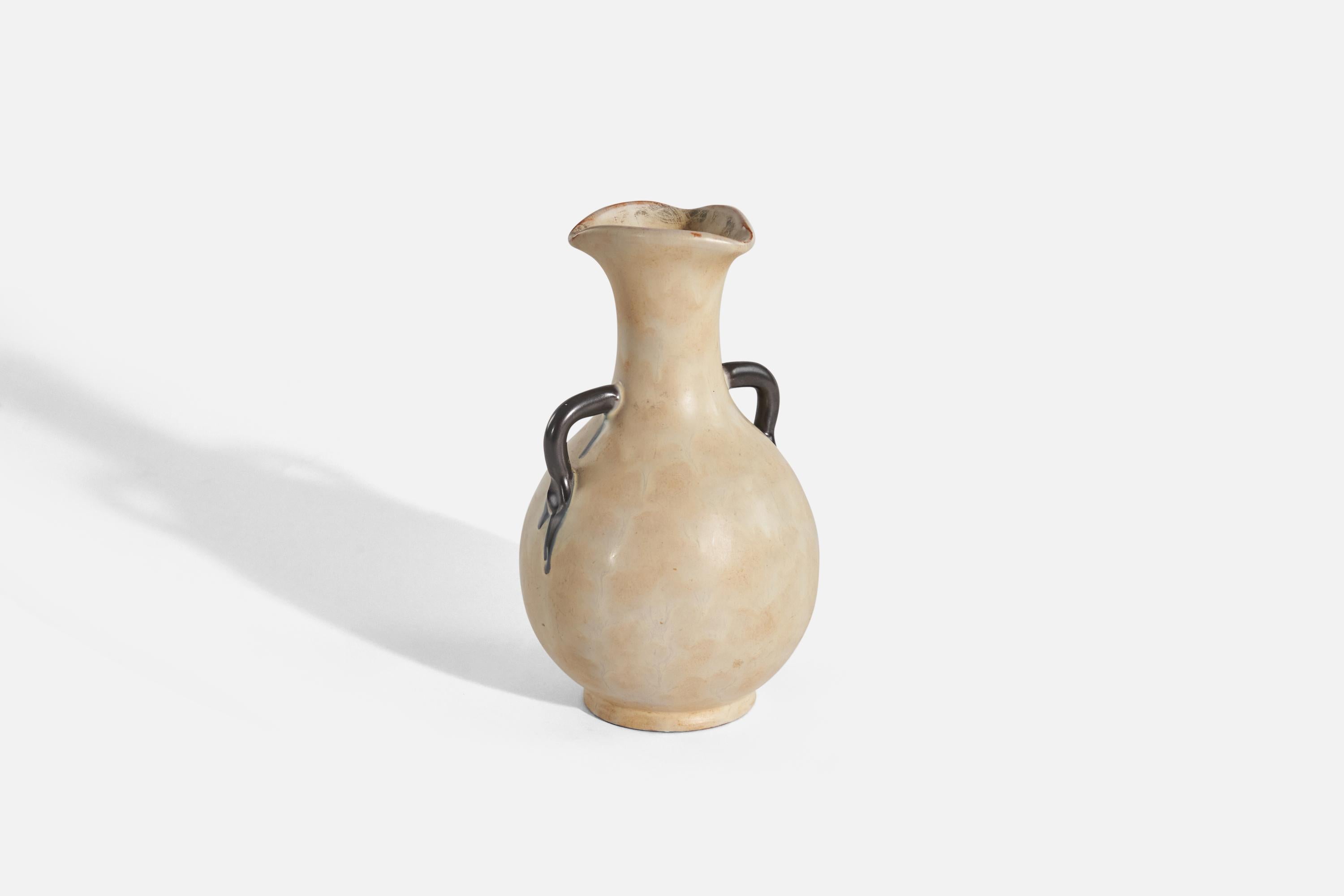 A beige and black, glazed earthenware vase designed by Harald Östergren and produced by Upsala-Ekeby, Sweden, c. 1930s.
 
