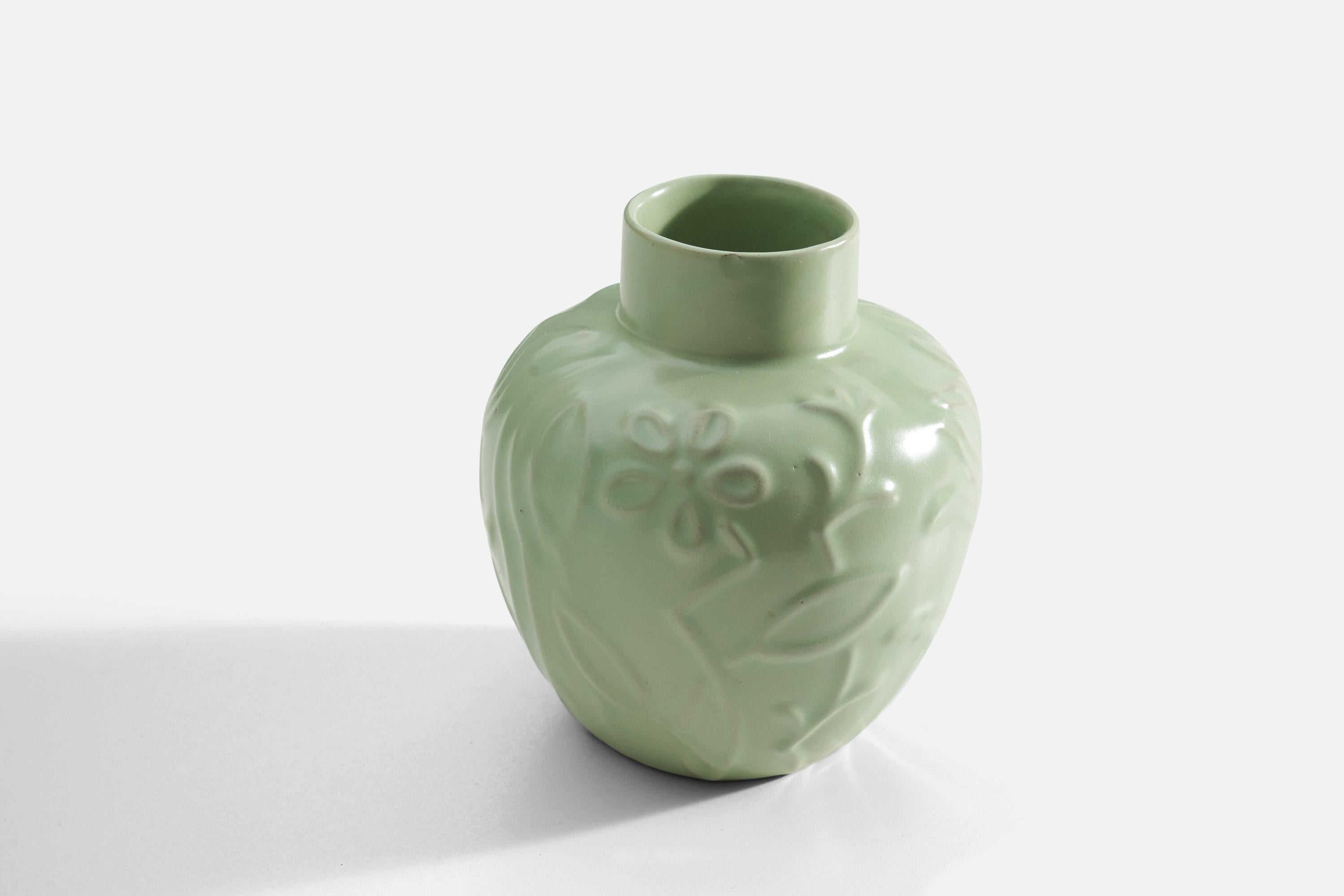 A green-glazed earthenware vase produced by Upsala-Ekeby, Sweden, 1940s. Designed by Harald Östergren (1888-1974)

 