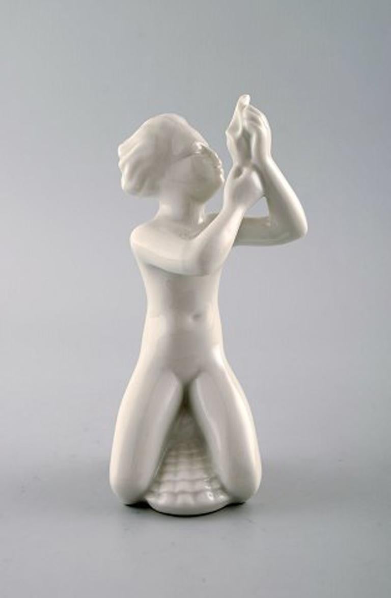 Harald Salomon for Rörstrand, four white glazed figures of sea children.
Hallmarked. 
In perfect condition.
Measures: 13 cm.
