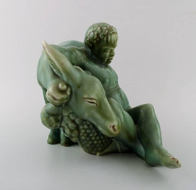 Harald Salomon for Rörstrand, green glazed pottery figure of Bacchus and donkey.
Stamped.
In perfect condition.
Measures: Height 18 cm., length 27 cm.