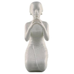 Harald Salomon for Rörstrand, White Glazed Figure of Balinese Holding Flower