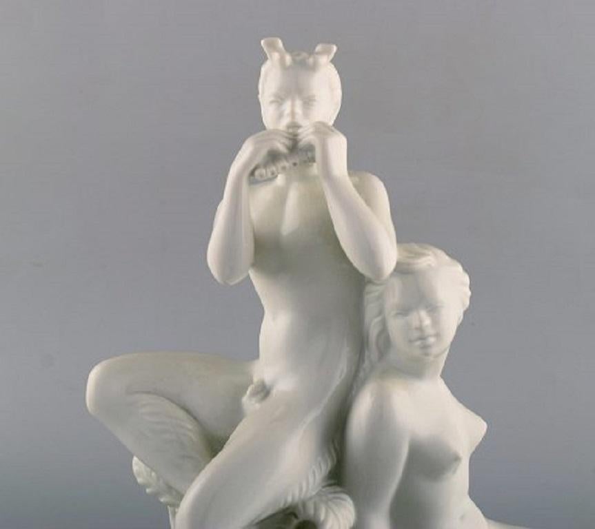 Harald Salomon for Rörstrand, white glazed porcelain Art Deco figure of a naked woman and flute-playing pan, 1940s.
Marked
In perfect condition.
Measures: 25 cm. x 25 cm.