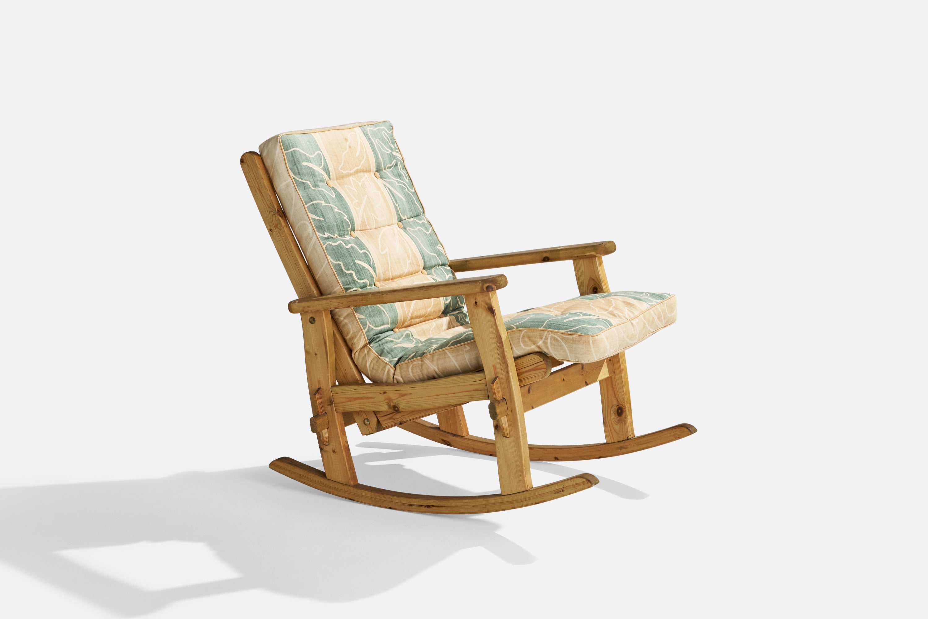 A pine and fabric lounge chair designed and produced by Harbo Fritid, Sweden, c. 1980s.

Seat height 19”.