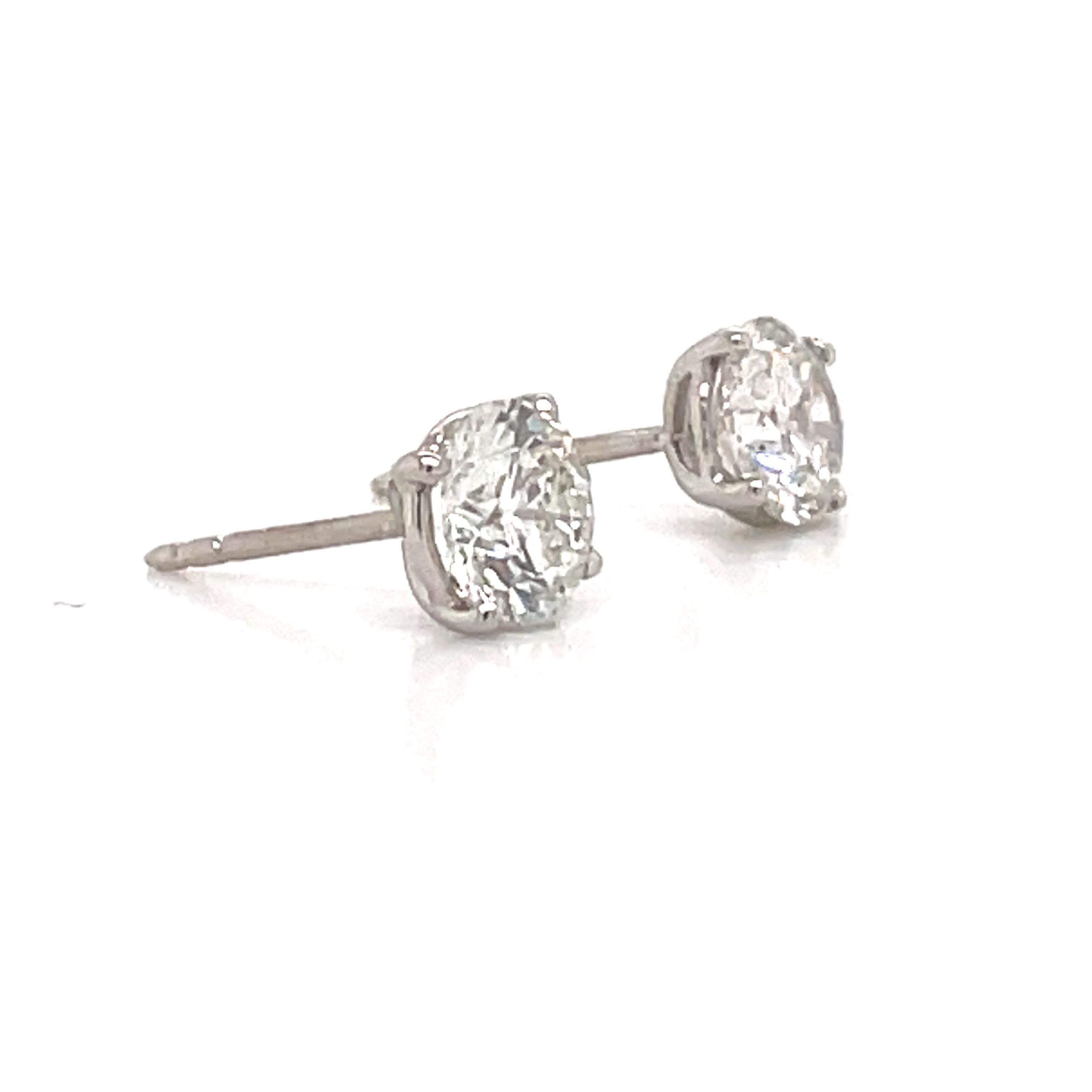 Round Cut Diamond Stud Earrings 2.29 Carat H I1 18 Karat White Gold