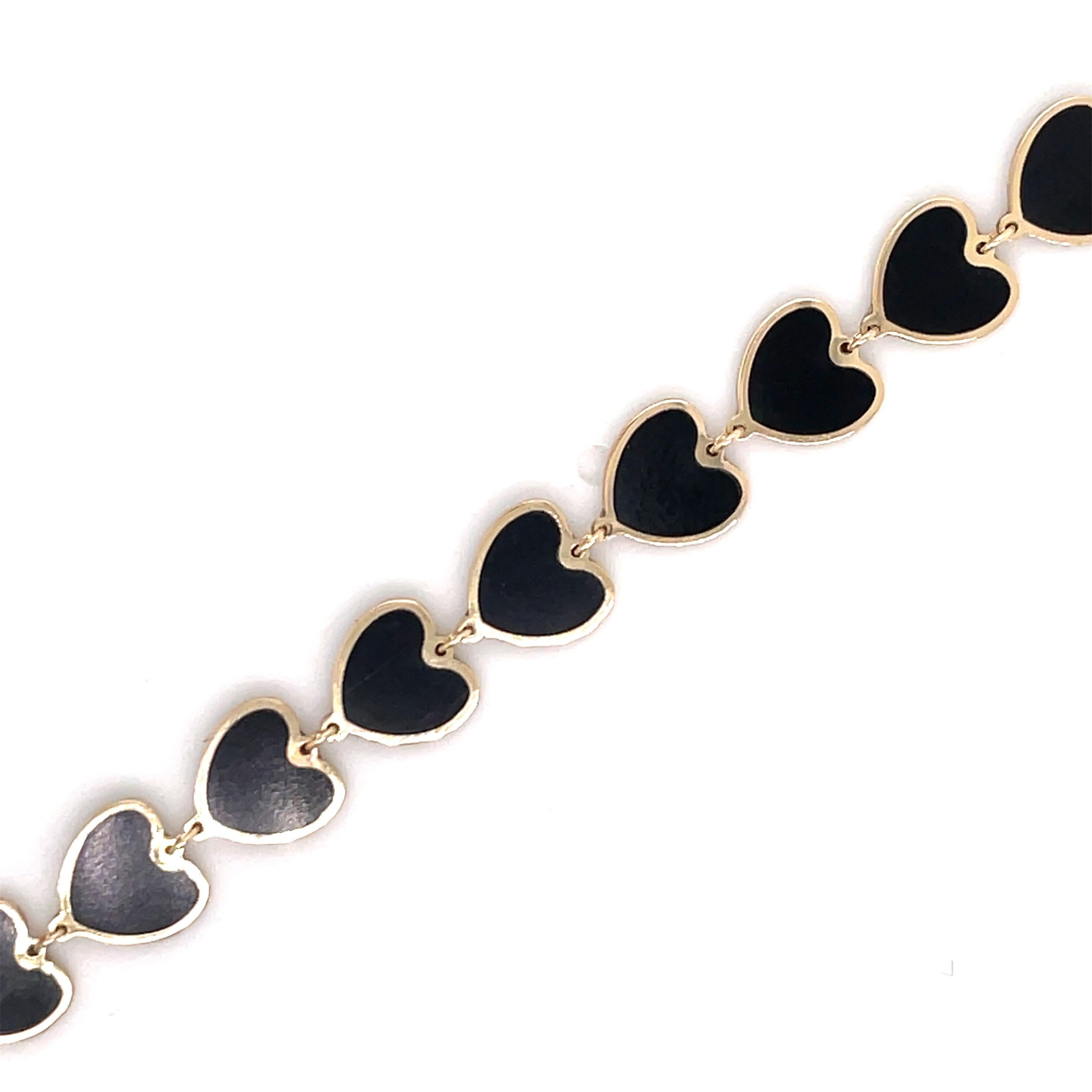 Italian 14k yellow gold heart onyx gold trim bracelet. 
Super fun and trendy! 
Available in different colors and styles. 