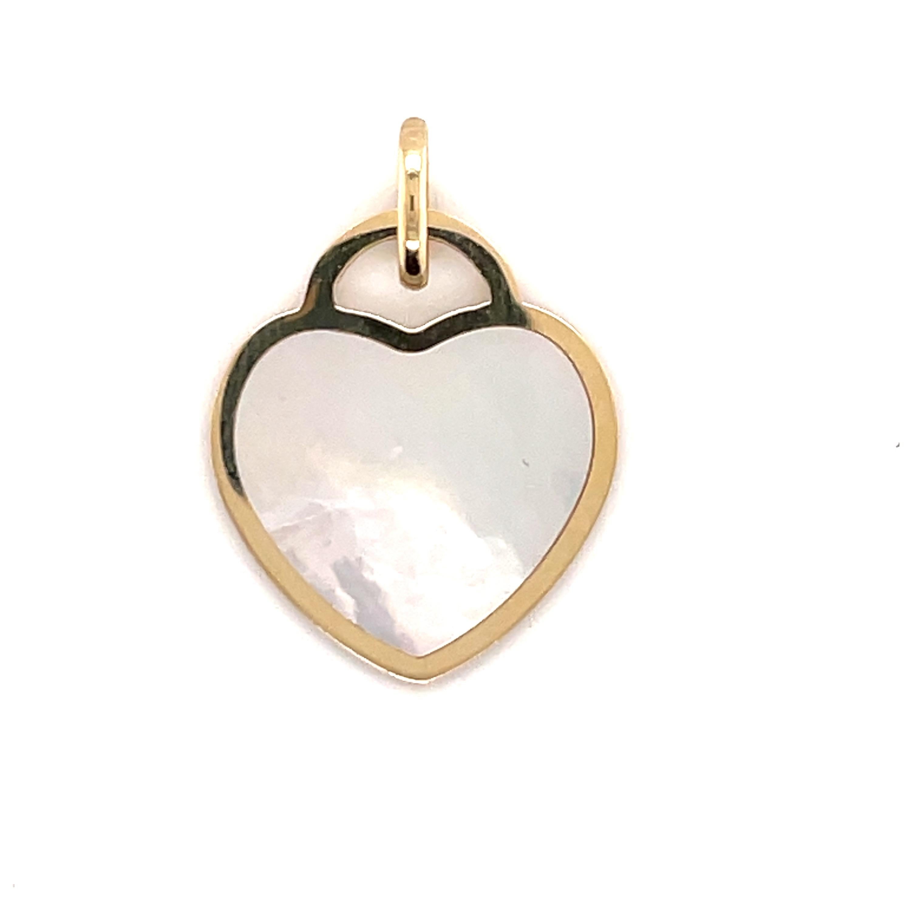 Italian 14K Yellow gold heart pendant featuring an onyx or mother of pearl center with yellow gold trim.
Can mix and match pendant/necklace. 
Heart comes in different colors. 
Paperclip necklaces are available and more fashion necklaces.
Build your