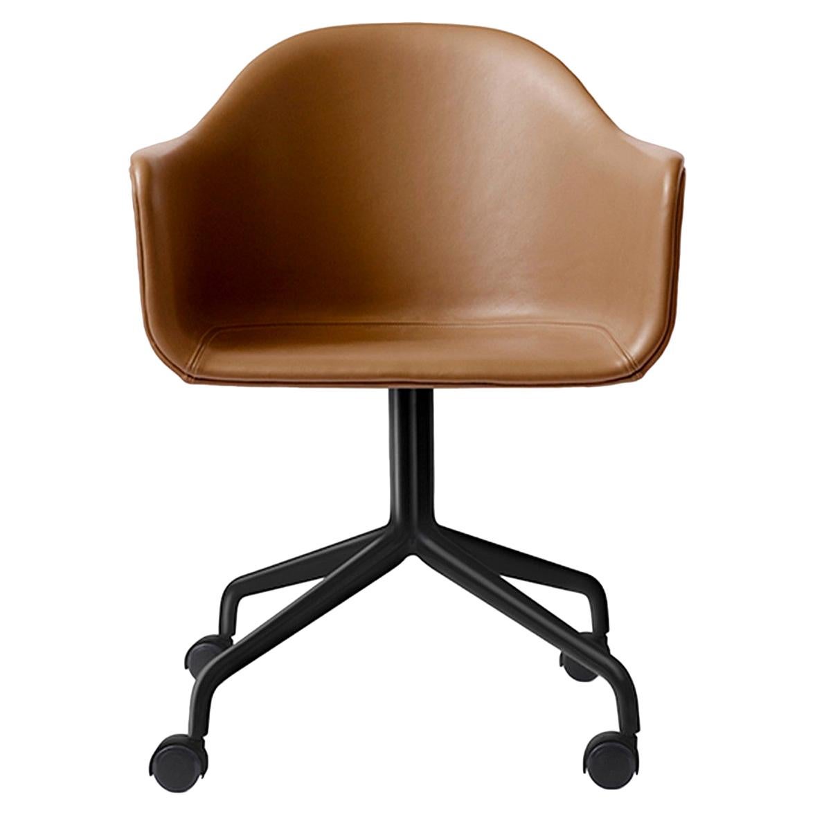 Harbour Chair, Cognac Leather Chair Black Steel Swivel Base and Casters For Sale