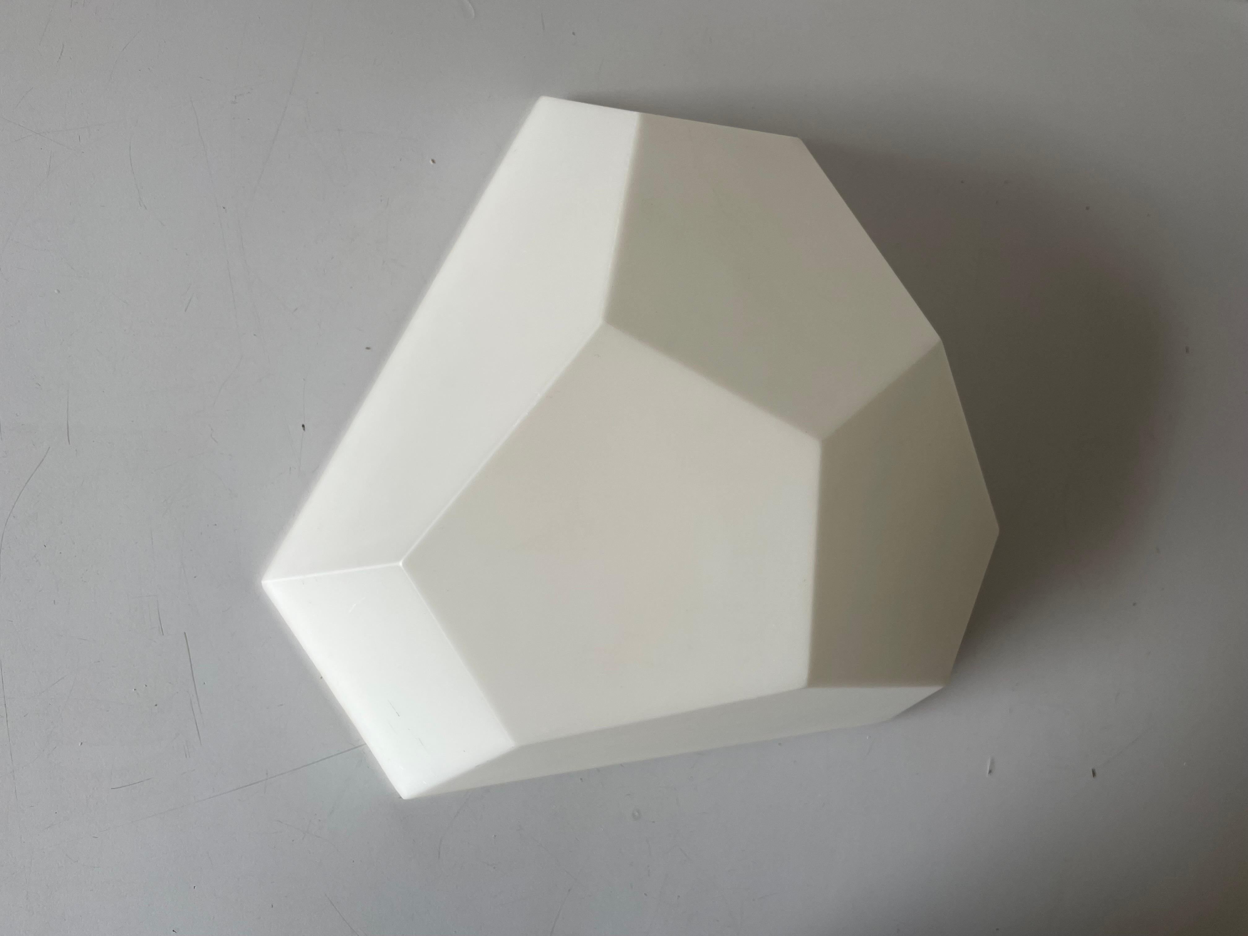 Exceptional hard plastic wall or ceiling lamp by Rudolf Dörfler, 1960s, Switzerland

Sculptural minimal design very elegant rare ceiling lamp flush mount.

It is very ideal and suitable for all living areas.

Lamp is in good condition. No