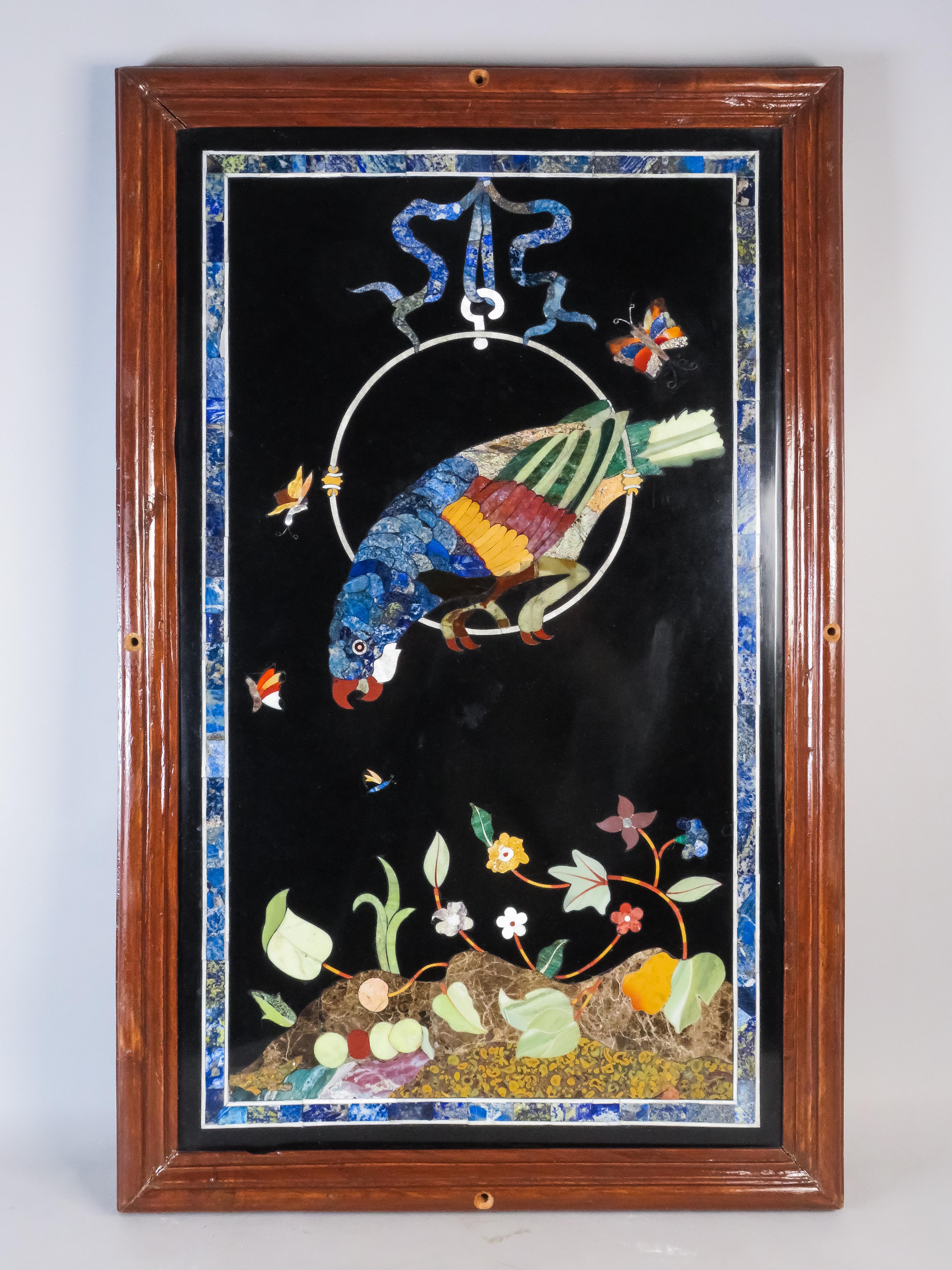 Hard stone mosaic panel depicting a parrot with a butterfly and plant motifs, late 18th-century Italy

Measurements with frame: 81 cm high x 52 cm wide
Measurements without frame: 73 cm high x 43 cm wide