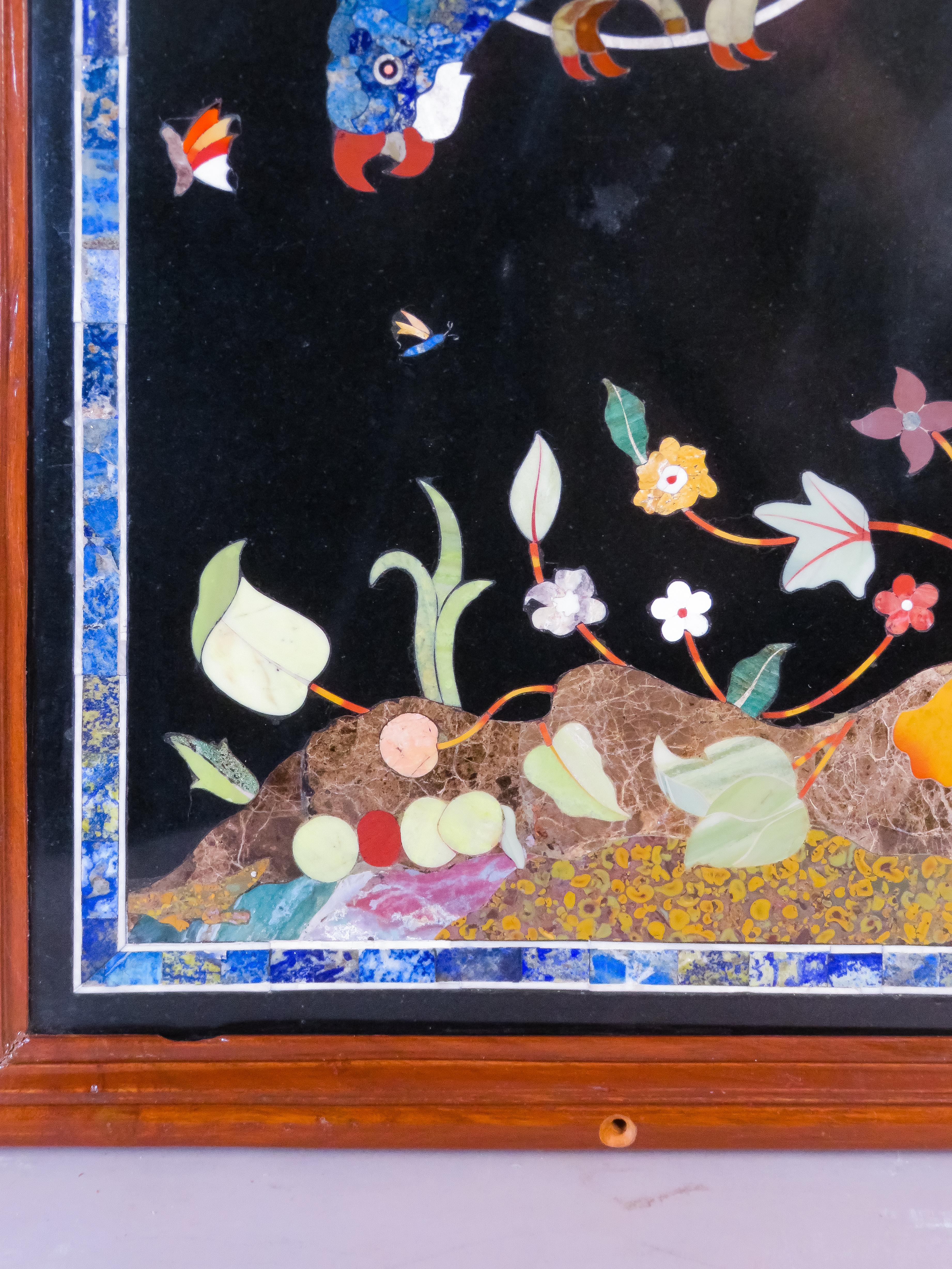 18th Century Hard stone panel depicting a parrot with a butterfly and plant motifs, Italy For Sale