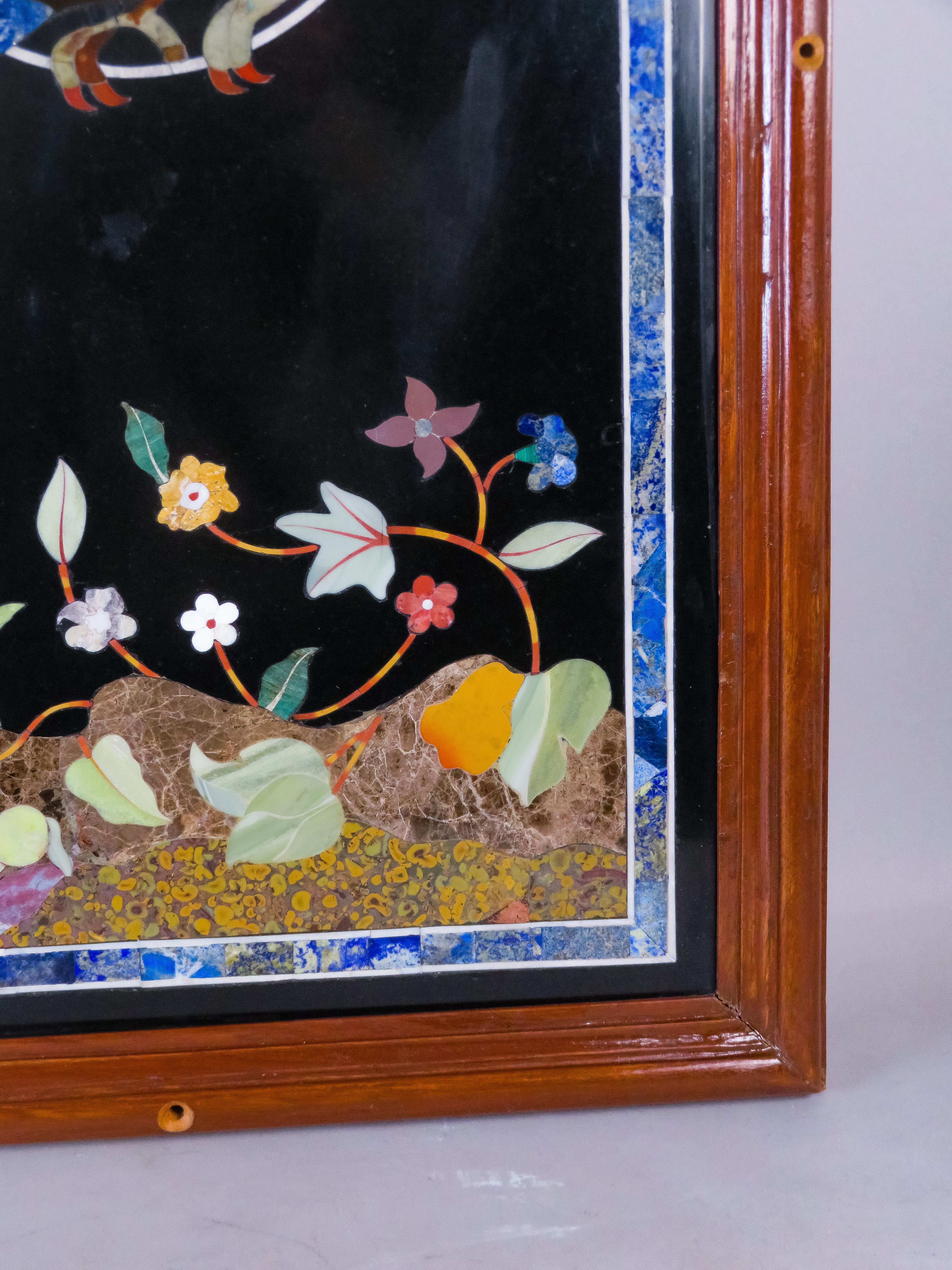 Stone Hard stone panel depicting a parrot with a butterfly and plant motifs, Italy For Sale
