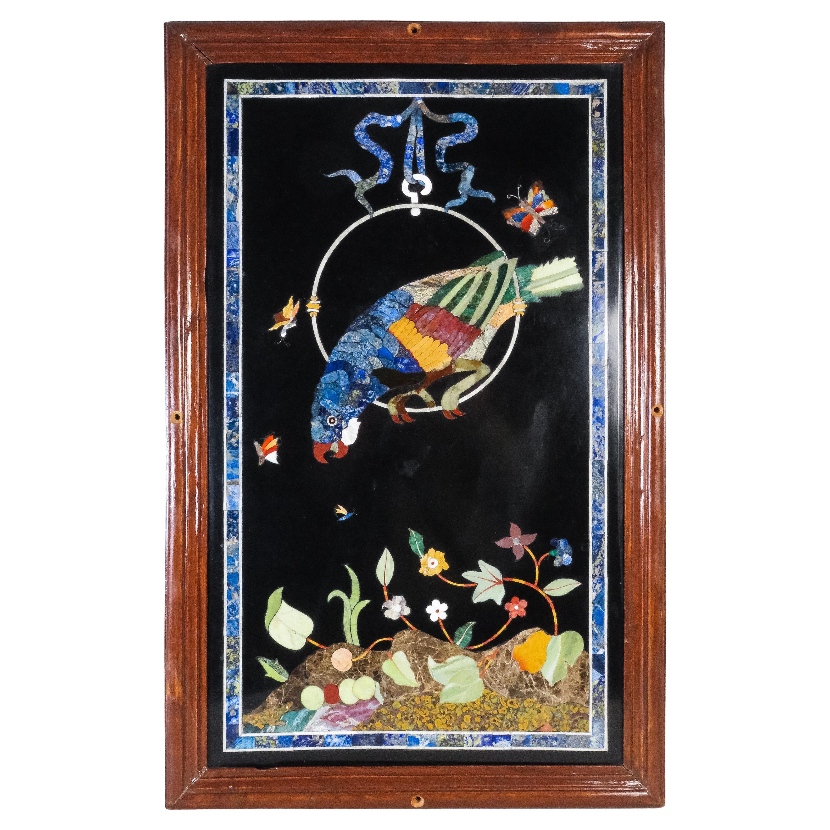 Hard stone panel depicting a parrot with a butterfly and plant motifs, Italy For Sale