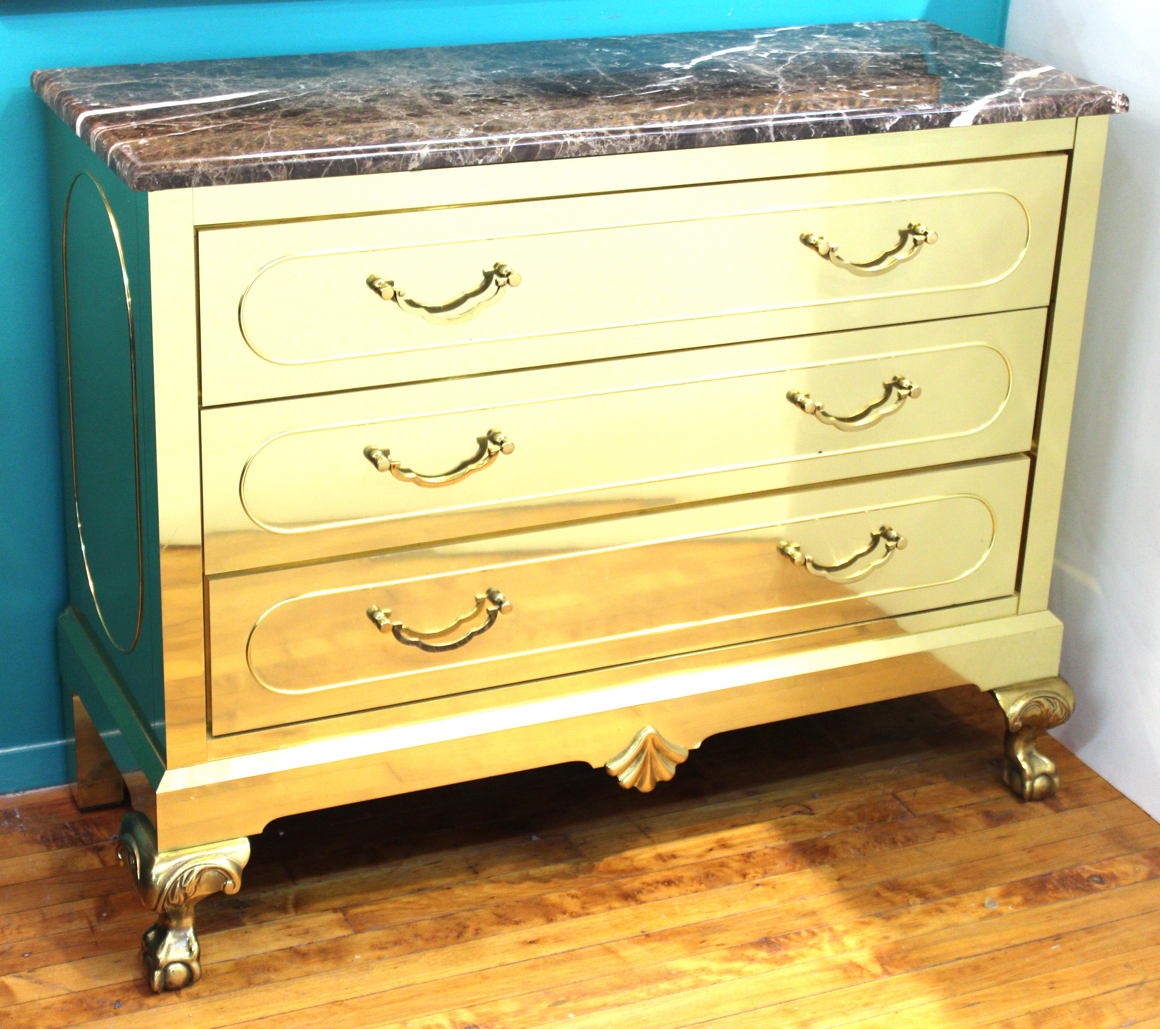 American Modern brass-clad chest of four drawers with marble top, made during the 1980's by Harden Furniture. The piece is part of the 'Import Collection' and has a marble top that is finished on all four sides. In great vintage condition.