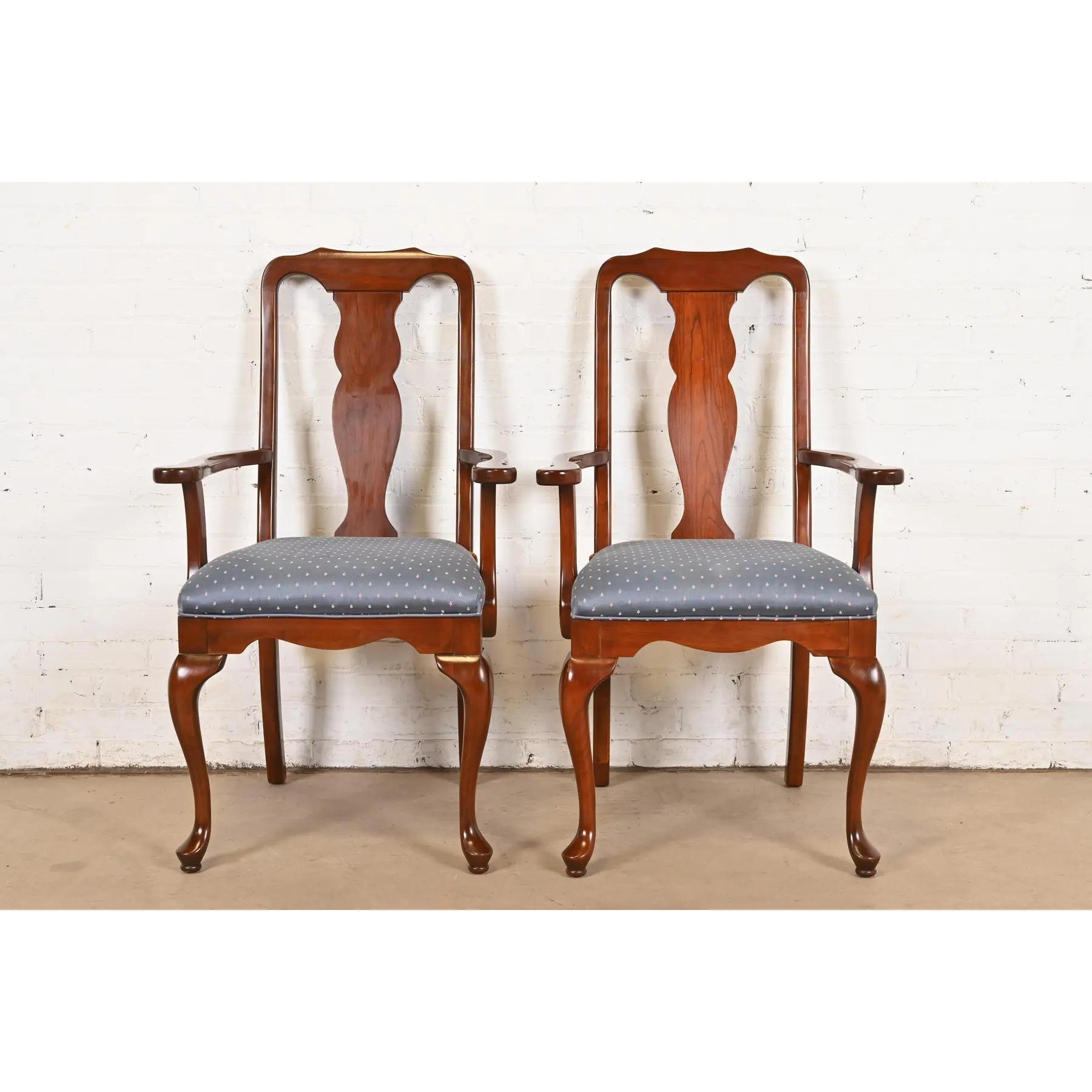 A beautiful pair of Queen Anne style armchairs or dining captain chairs

By Harden Furniture

USA, Late 20th Century

Solid carved cherry wood frames, with upholstered seats.

Measures: 24