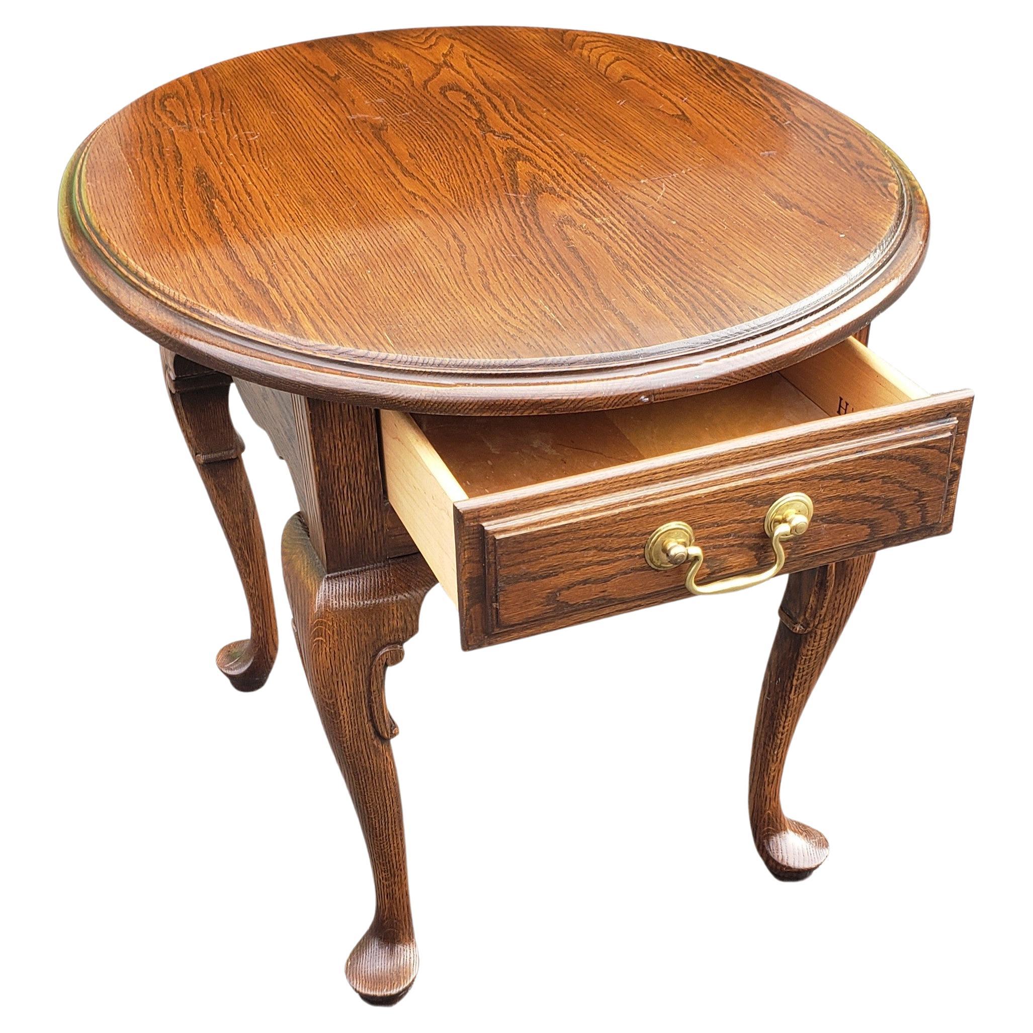 Harden solid oak single drawer oval side table measuring 24.5
