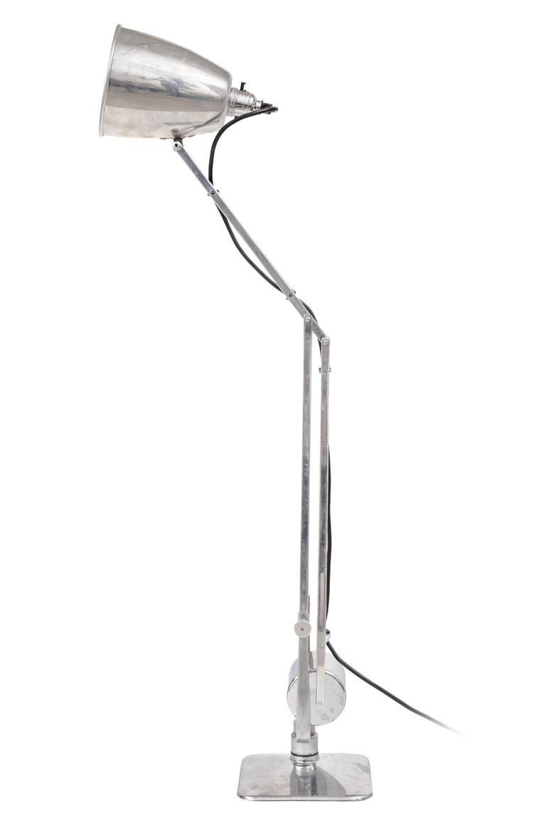An early version of the articulating desk lamp with the additional appeal of the attractive and functional counter balance.