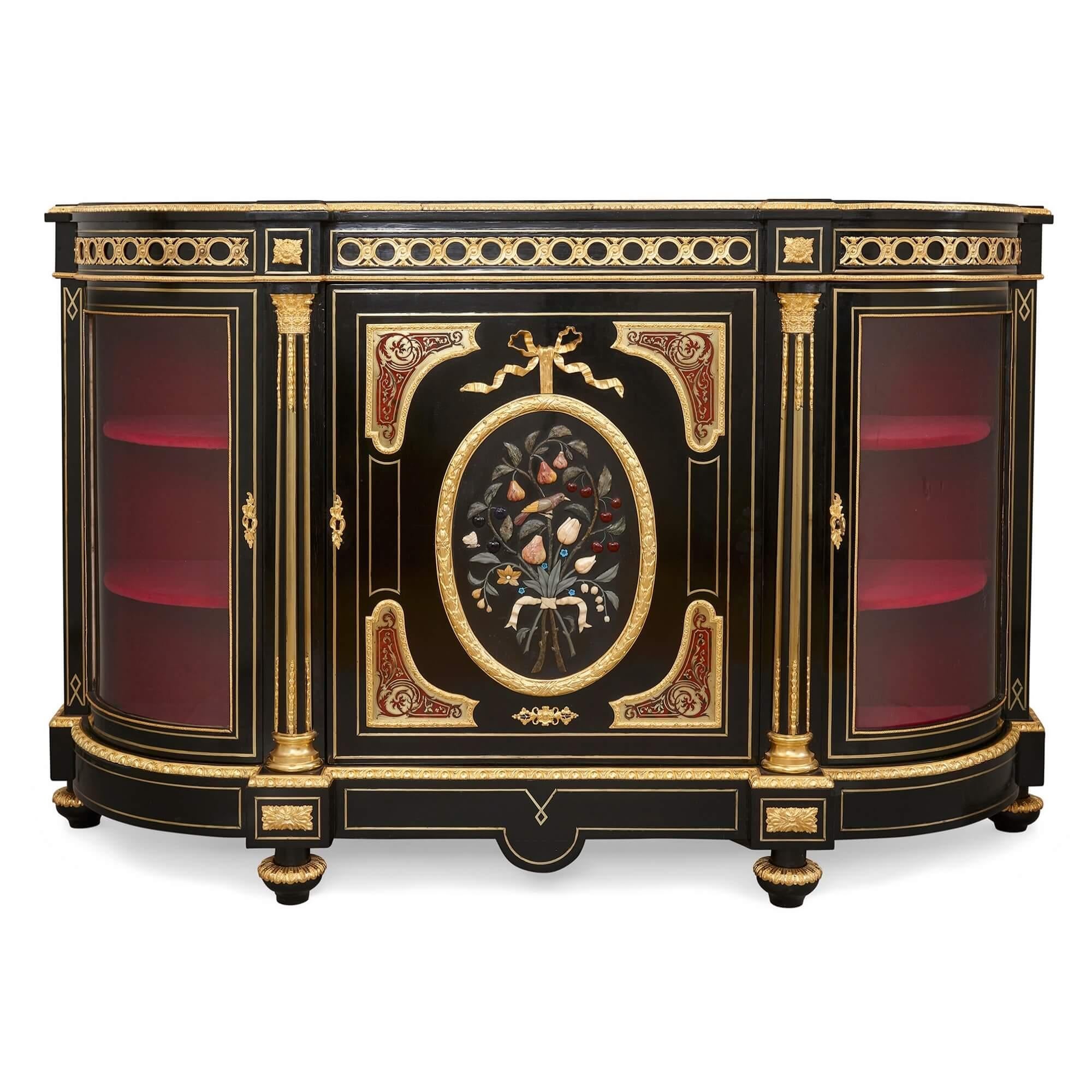 Hardstone, ormolu and Boulle mounted ebonised wood sideboard
French, Late 19th Century
Height 114cm, width 178cm, depth 50cm

This splendid sideboard, carved from ebonised wood, stands as an exceptional testament to the fine craftsmanship in late