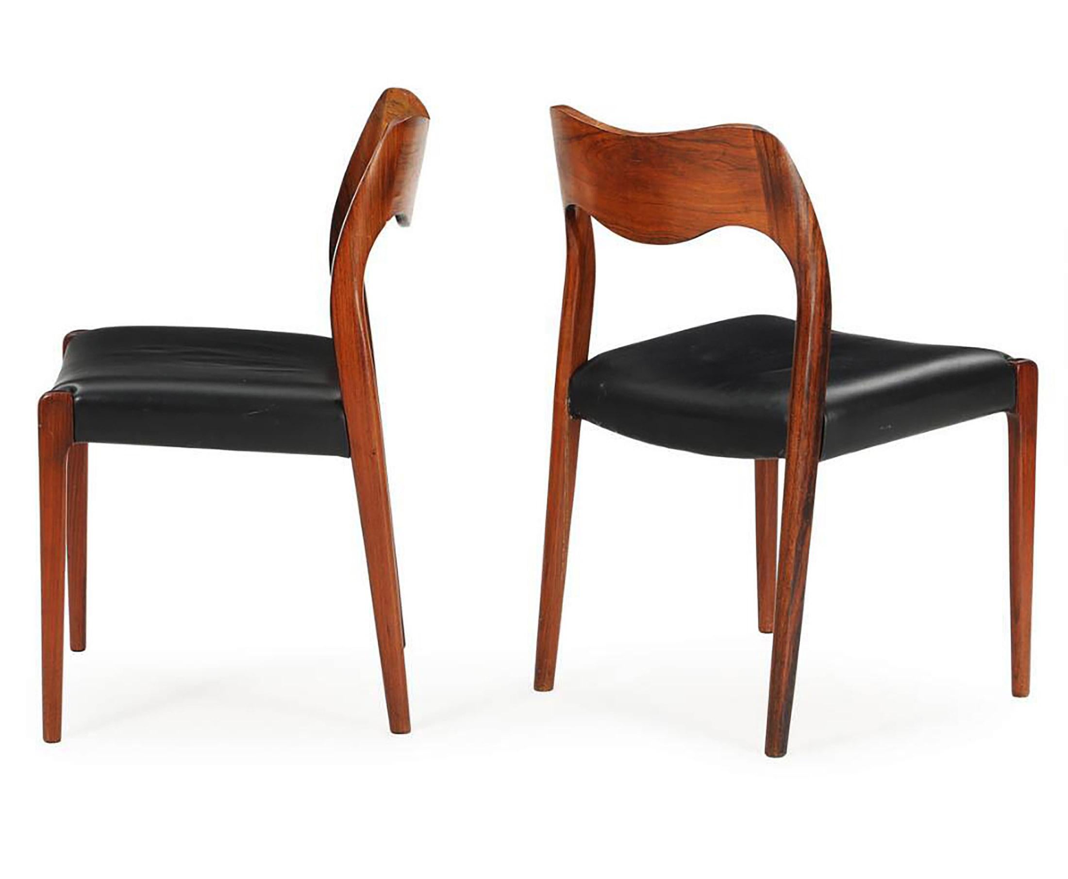 Hardwood frame with black leather upholstered seat, designed by Niels Otto Møller 1963 in Denmark, mdel 71. Original condition not restored. Set of four.
