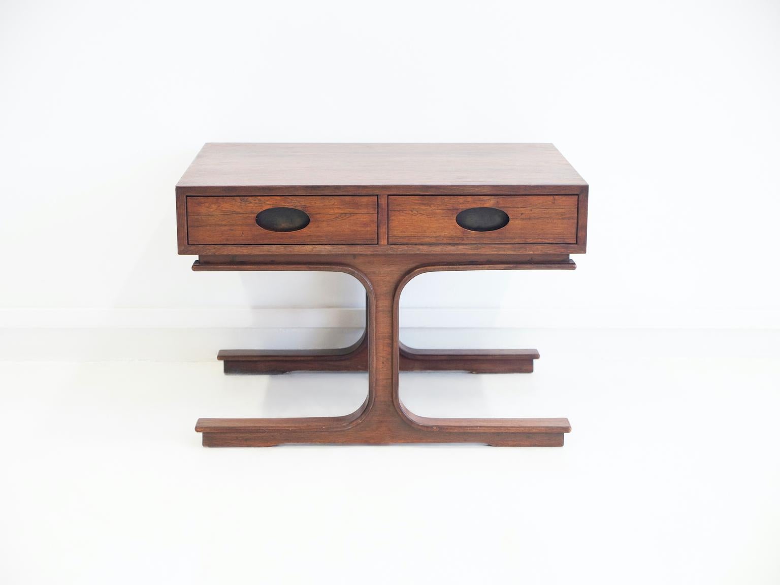 Small side table or a nightstand of hardwood. Designed by Gianfranco Frattini and produced by Bernini, Italy around 1960. Two drawers with built-in handles and central foot on two sides.
 