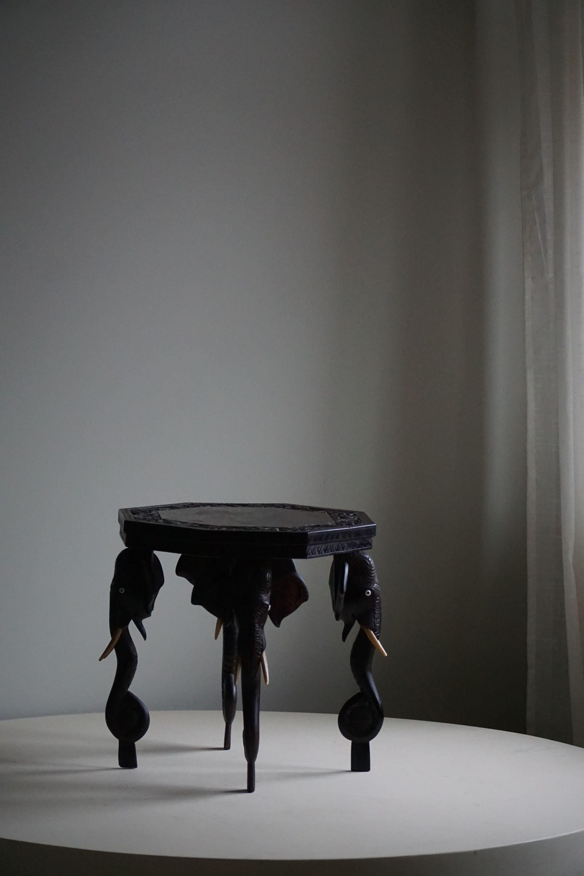 Carved Hardwood Side Table with 4 Elephant Head Legs, Anglo Indian, 1920s For Sale