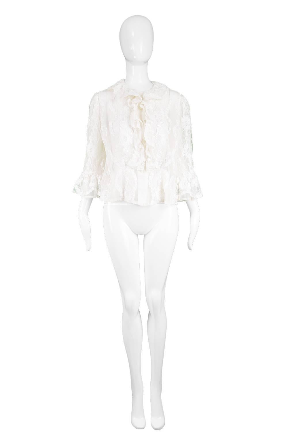 Hardy Amies Couture Vintage 1970s White Chantilly Lace Ribbonwork Ruffle Shirt


Estimated Size: Women's Medium. Please check measurements. 
Bust - 40” / 101cm
Waist - 38” / 96cm
Length (Shoulder to Hem) - 20” / 51cm
Shoulder to Shoulder - 15” /
