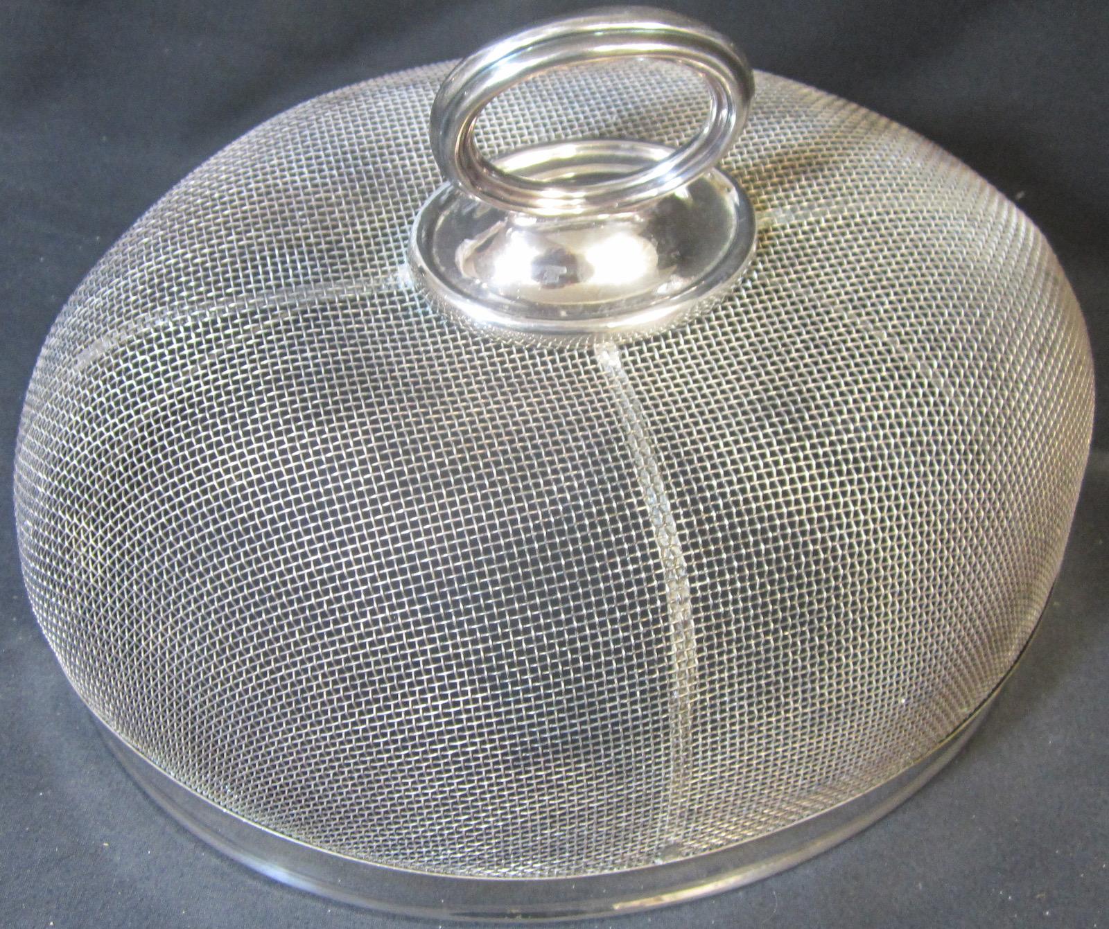 Hardy Bros, silver plated food cover.
This item was made in England for Australian retailer Hardy Bros.
Hardy Brothers was a specialty retailer and private company of fine jewellery, timepieces and decorative arts in Australia. Its historic products