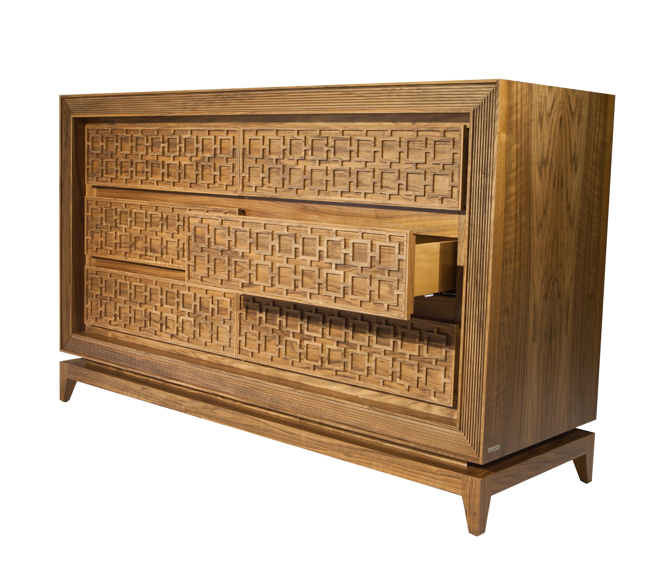 Grand in scale and beauty, the Harem dresser is a nod to chinoiserie motifs with intricate facade detailing and a tapered solid wood base.