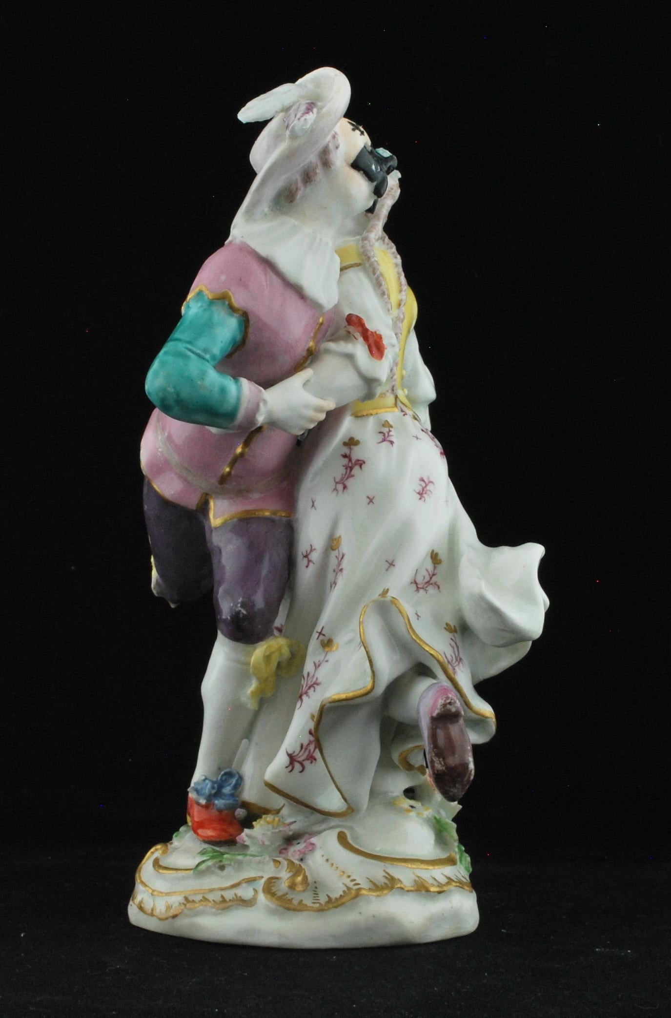 harlequin and columbine figurines