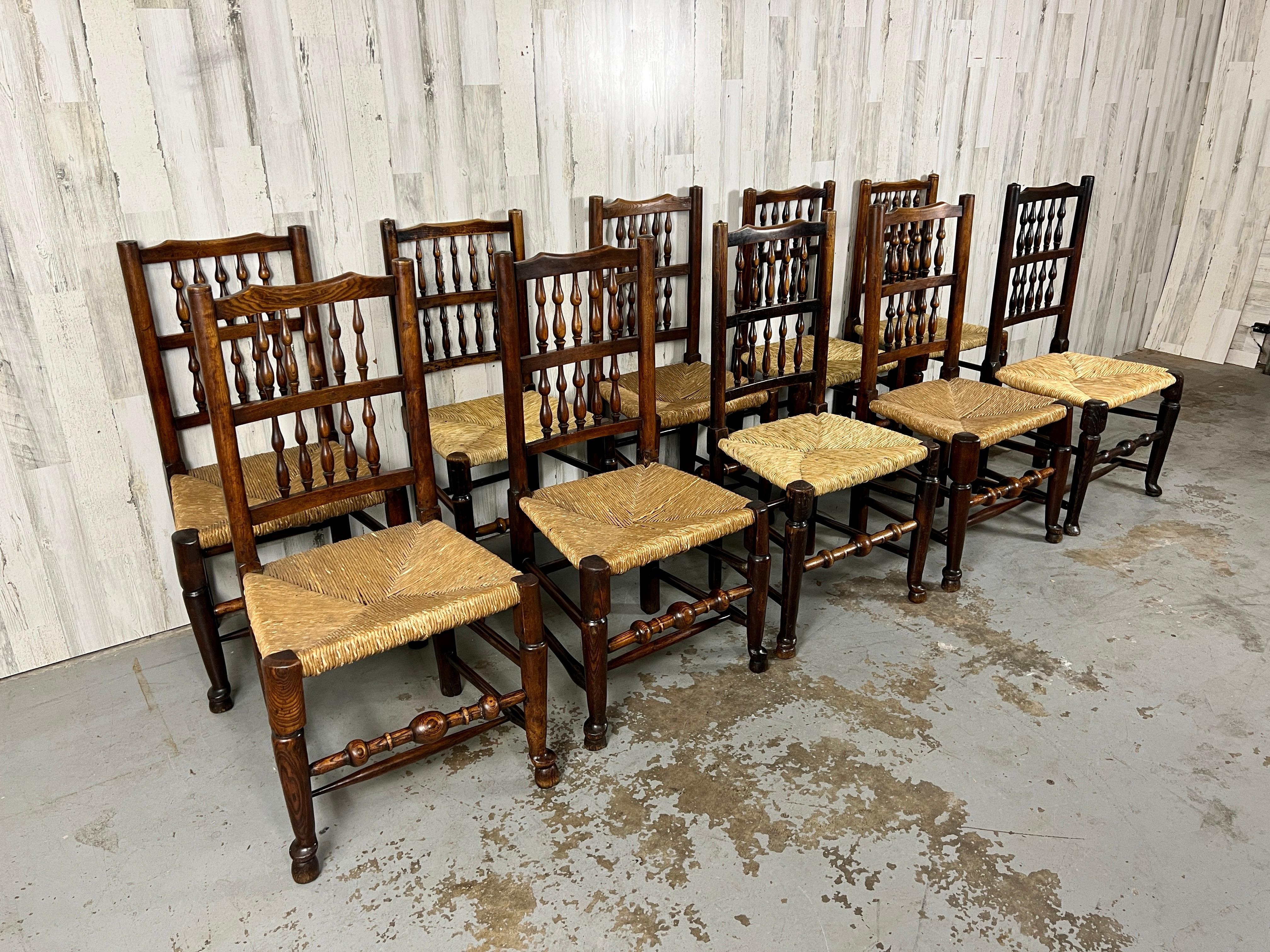 Georgian antique harlequin spindle back dining chairs with woven rush seats
Some of the chairs are taller than the others. Appears to be a set of four married with a set of six. each chair has its own personality.
Shorter chairs measure: 37.5 H x 19