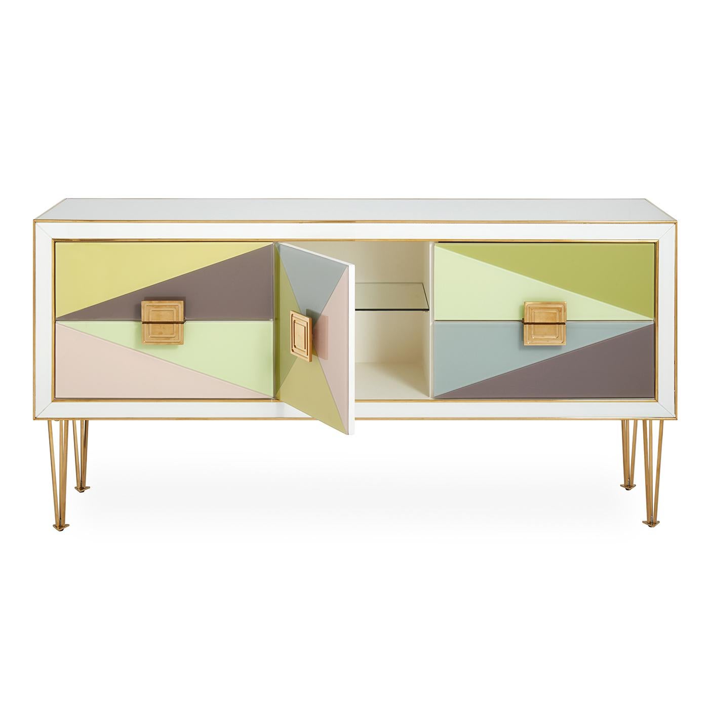 Avant Wow. A little Italian Modern, a lot of irresistible color. Our Harlequin Credenza features back-painted glass panes in angular forms in muted, sunrise-inspired hues. The ivory case is tipped with brass edging, adorned with super-modern grooved