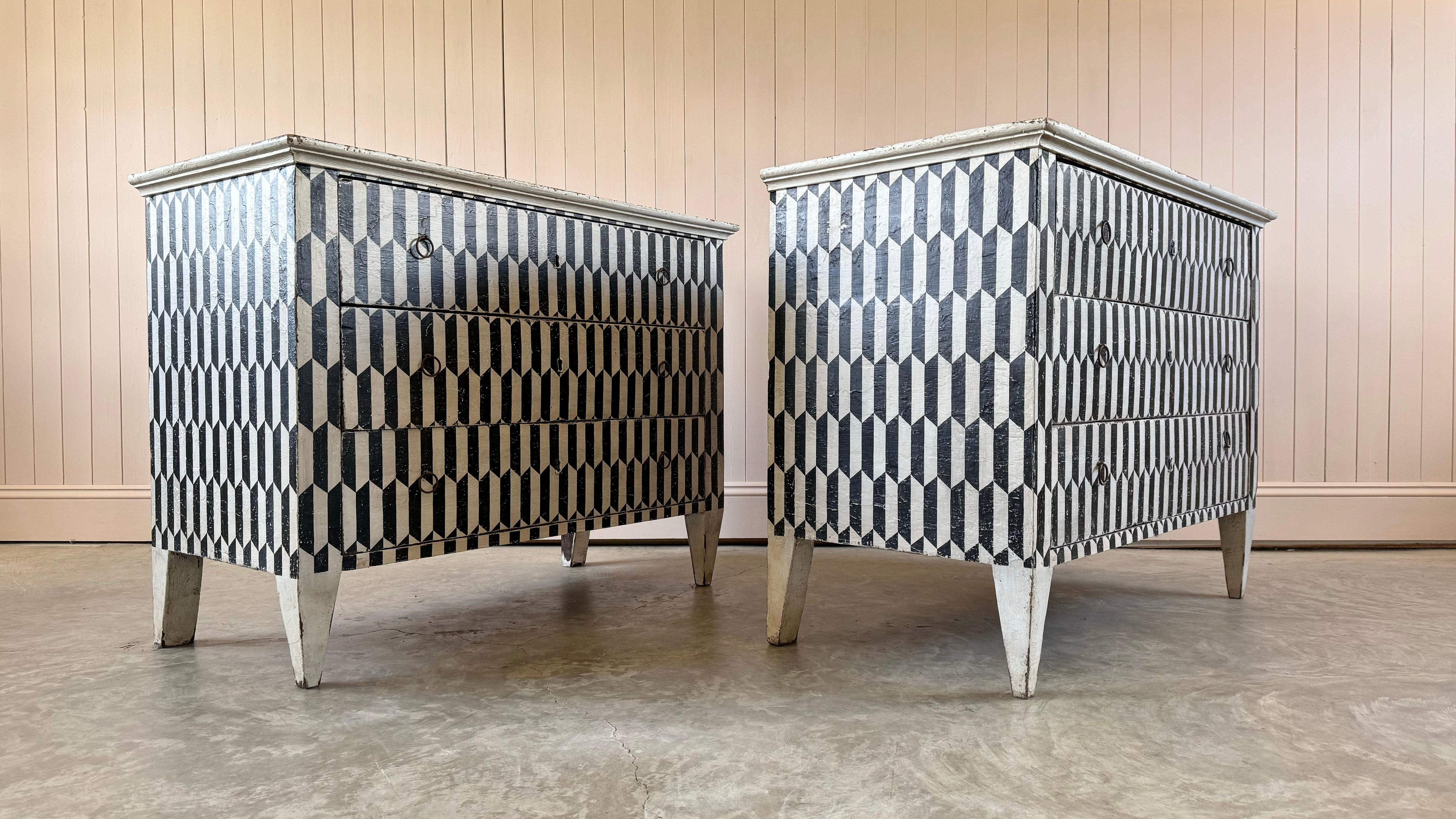 We sourced this wonderful pair of chest of drawers from Catalonia, Spain.  The drawers are late 19th century in their original white which has had the black harlequin geometric design added to it more recently.

To the untrained eye you wouldn't
