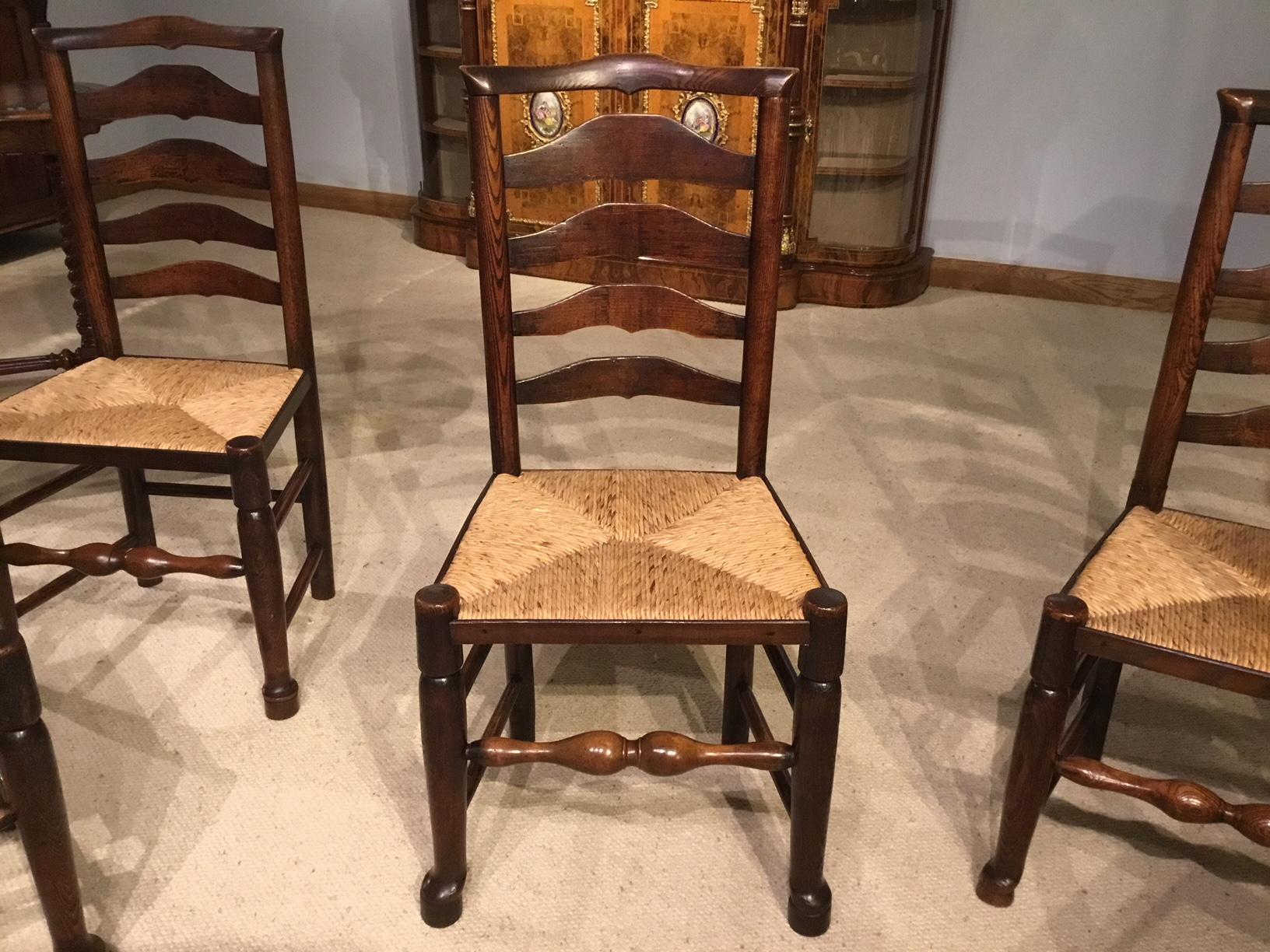 Harlequin Set of 8 Early 19th Century Ash and Elm Ladder Back Dining Chairs 8