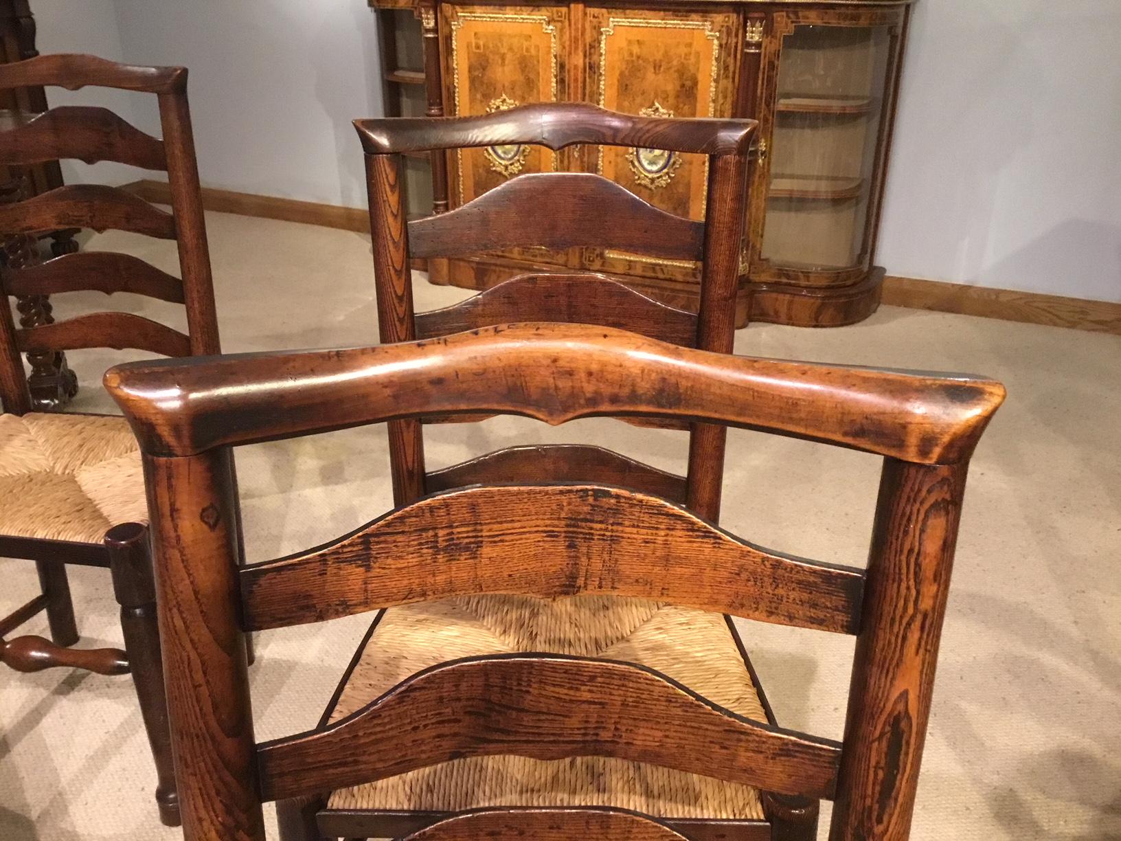 Harlequin Set of 8 Early 19th Century Ash and Elm Ladder Back Dining Chairs 9