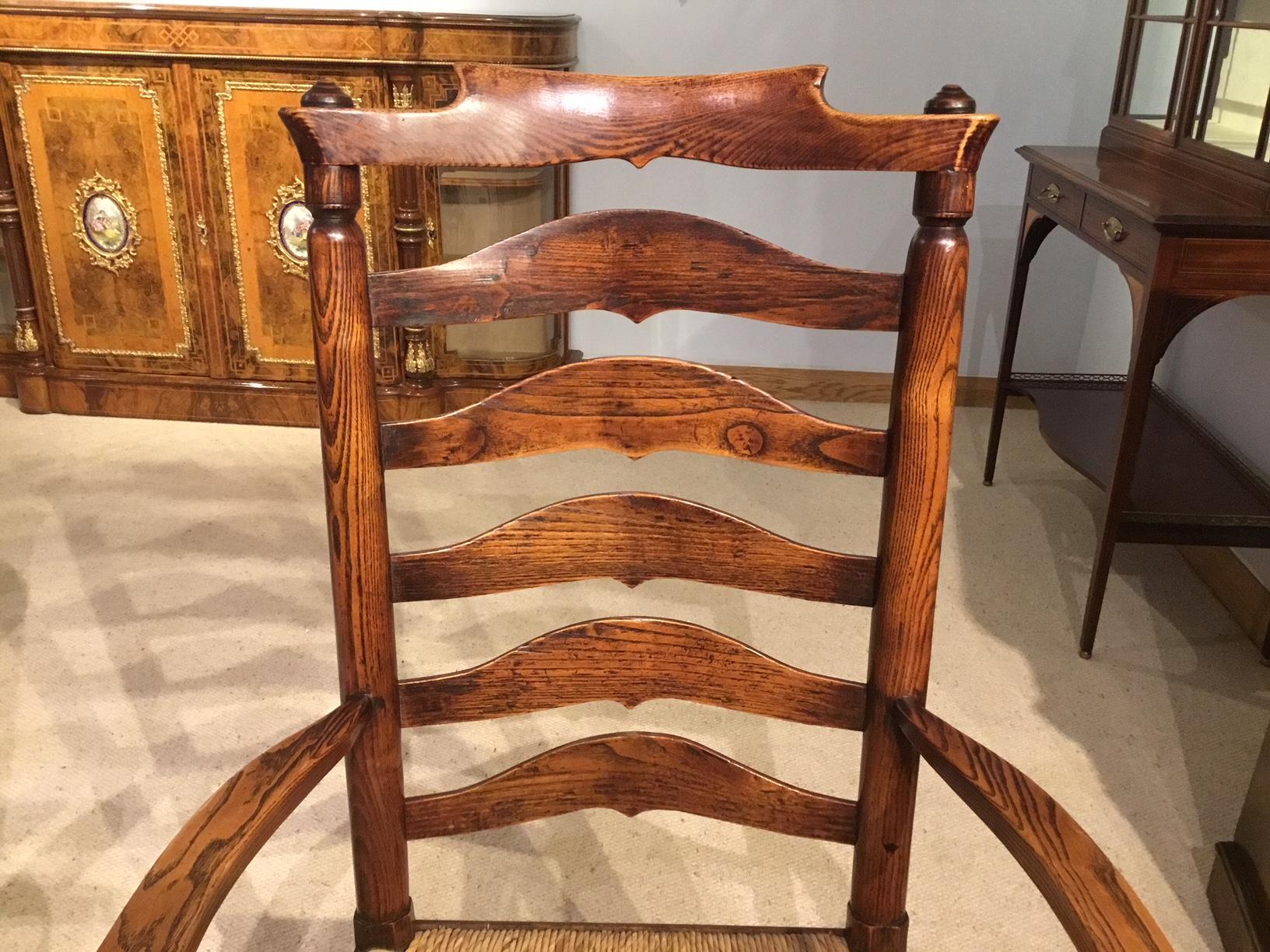 Harlequin Set of 8 Early 19th Century Ash and Elm Ladder Back Dining Chairs 11