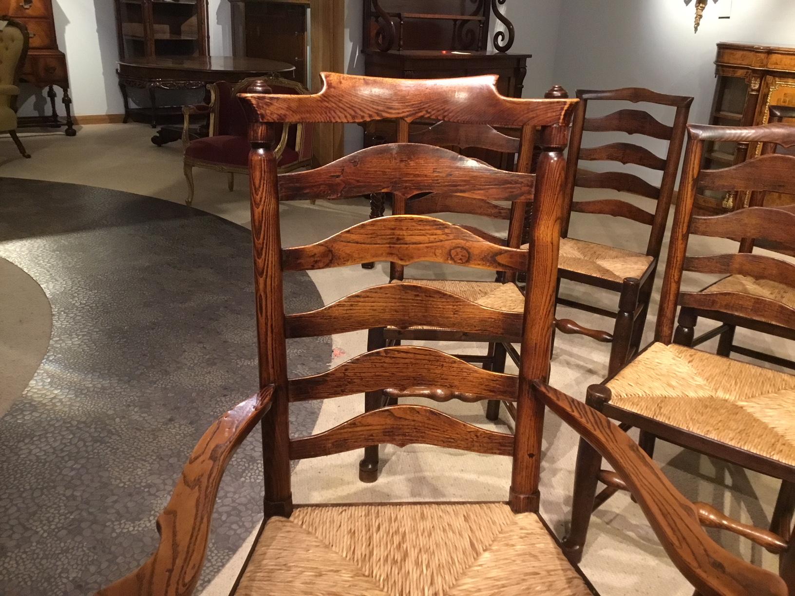 Harlequin Set of 8 Early 19th Century Ash and Elm Ladder Back Dining Chairs In Excellent Condition In Darwen, GB