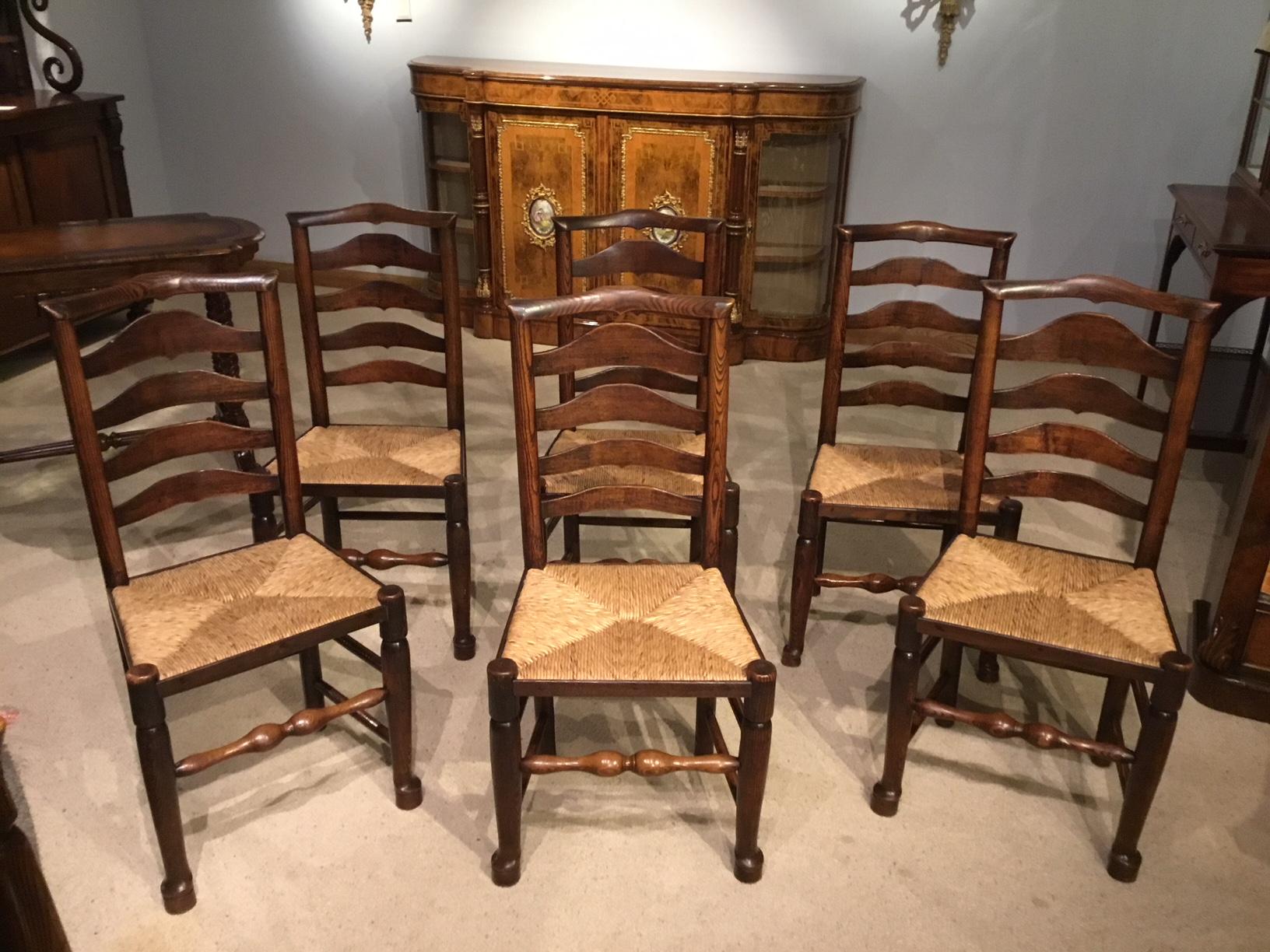 Harlequin Set of 8 Early 19th Century Ash and Elm Ladder Back Dining Chairs 2