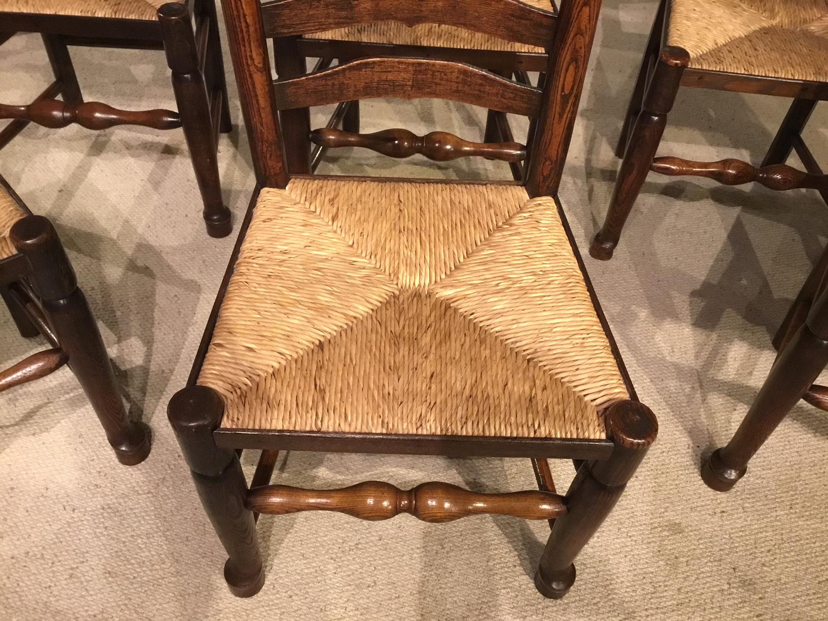 Harlequin Set of 8 Early 19th Century Ash and Elm Ladder Back Dining Chairs 5
