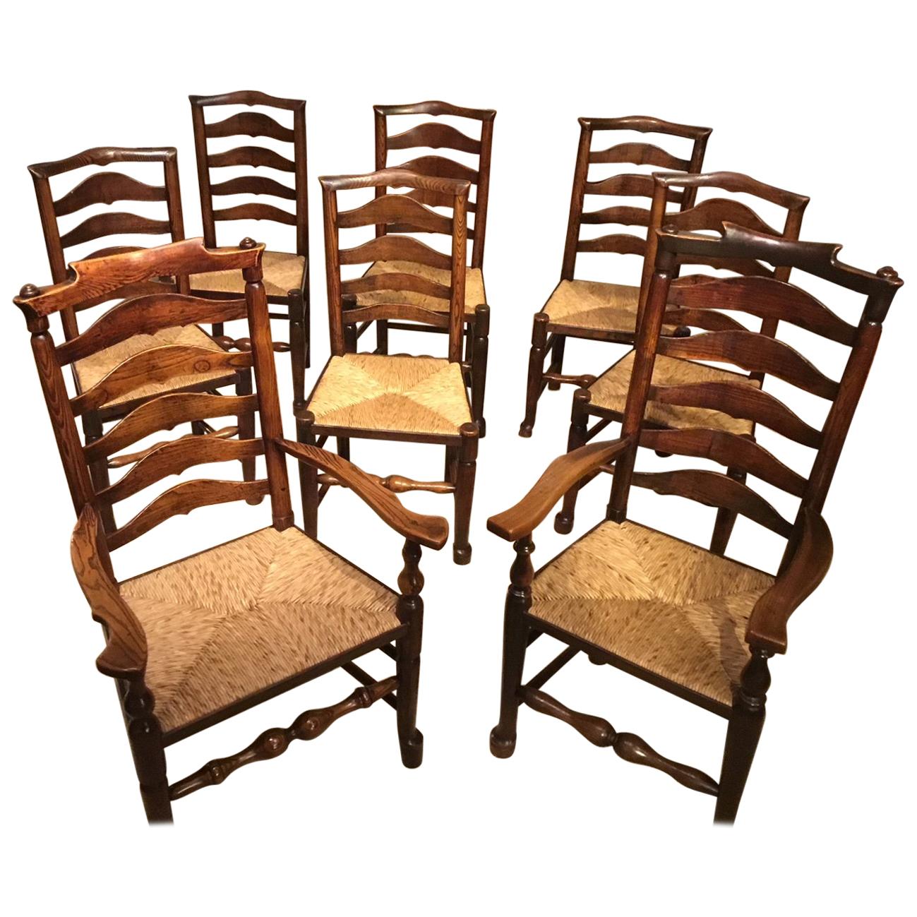 Harlequin Set of 8 Early 19th Century Ash and Elm Ladder Back Dining Chairs