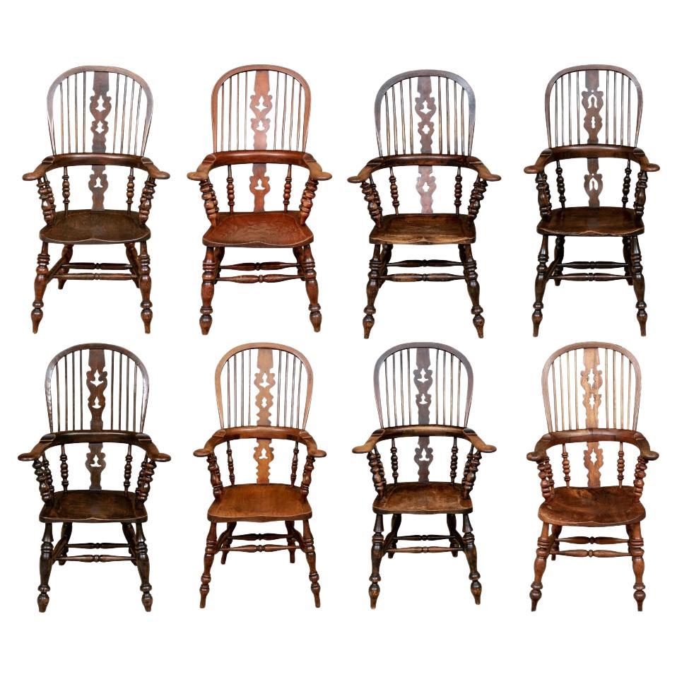 Harlequin Set Of Eight Broad Arm High Back Windsor Chairs