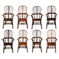 Harlequin Set Of Eight Broad Arm High Back Windsor Chairs