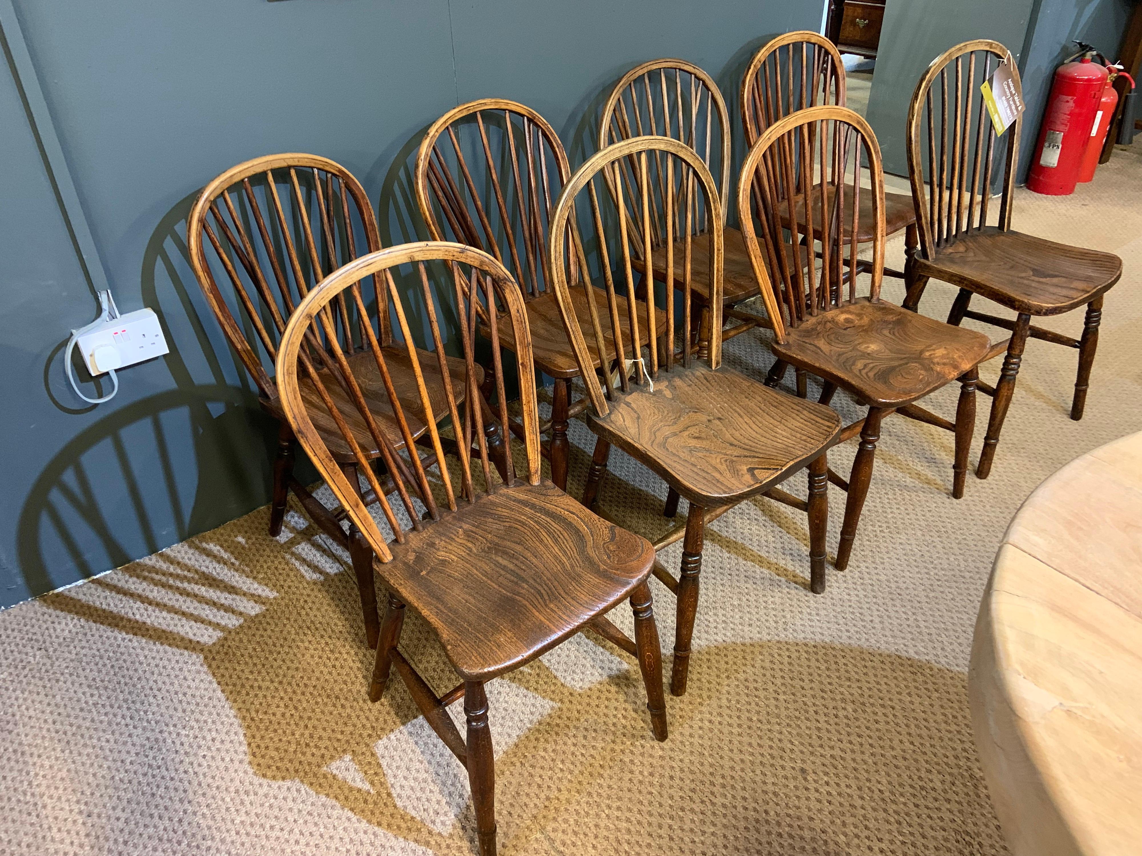 A harlequin set of eight Windsor stickback chairs fully restored. Beautiful patination and colour.
