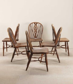 Harlequin Set of Six 19th Century Wheel Back Chairs