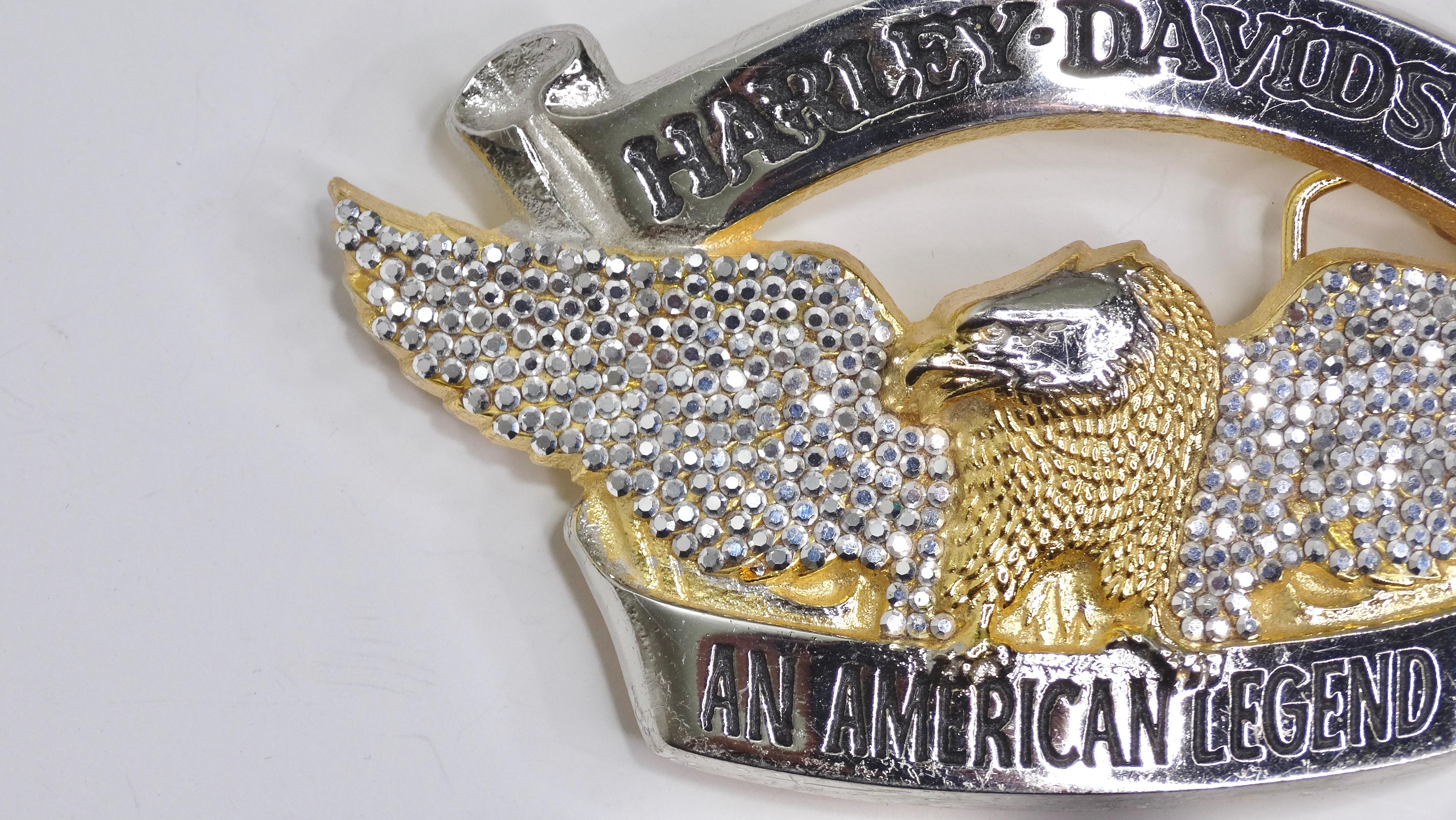 Harley Davidson but make it GLAM! Catch someone's attention from across the room with this belt buckle that is adorned with crystals. Large in size, it depicts an eagle with crystalized wings and a banner on the top reading 'HARLEY DAVIDSON' and a