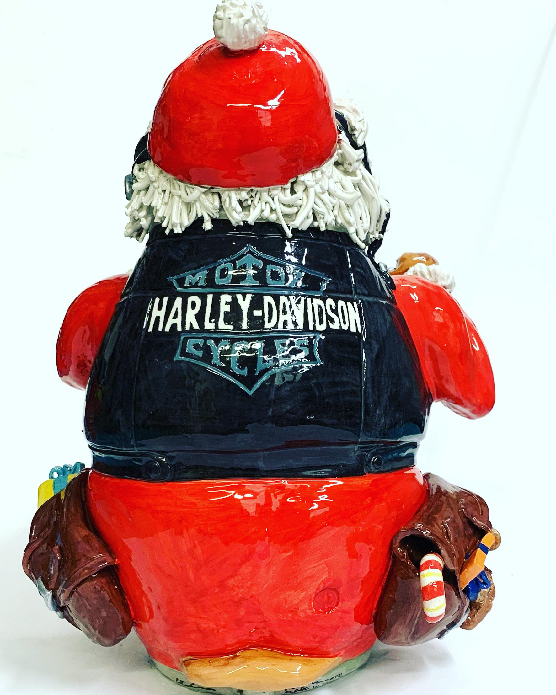 The piece is a funny revisiting of the Harley-Davidson myth. Santa Claus is riding this famous bike bringing his famous Christmas gifts. 
Our designer creates these pieces completely by hand.
    