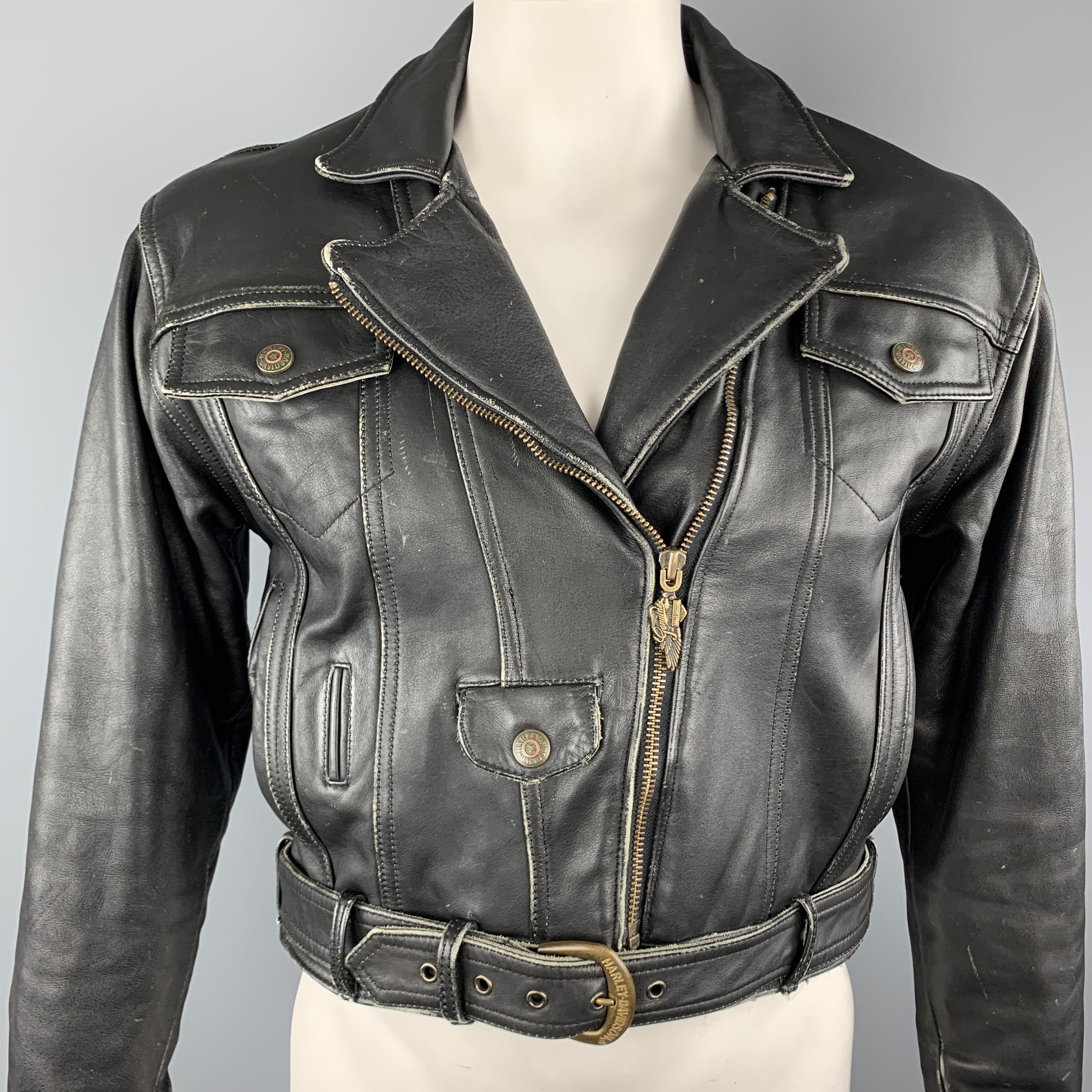 Vintage HARLEY DAVIDSON biker jacket comes in distressed antique effect leather with a classic pointed lapel, slanted zip closure with gold tone engraved tab, belted waist, and multiple pockets. 

Good Pre-Owned Condition.
Marked: